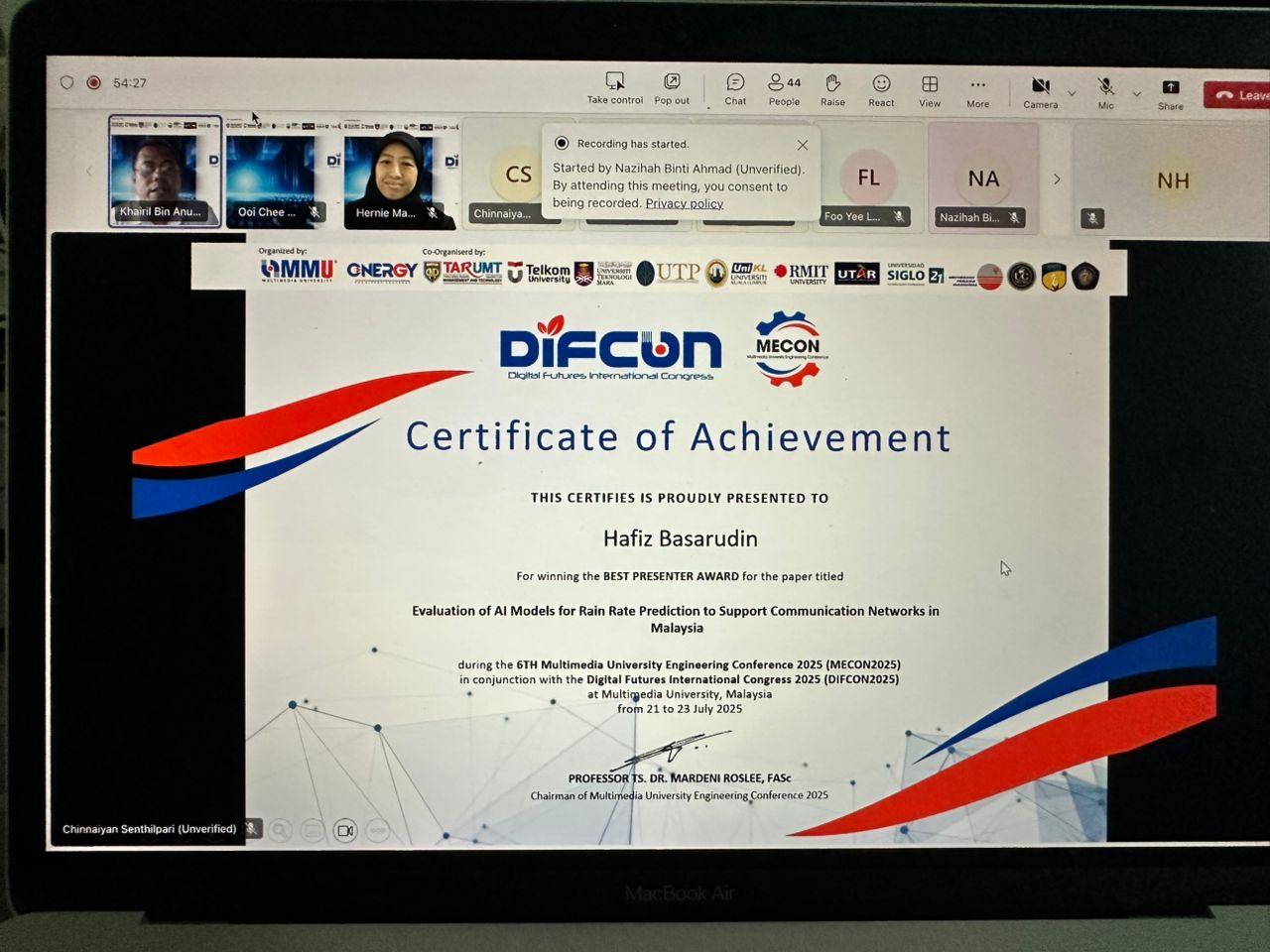 Dr Hafiz receiving his certificate during the virtual closing ceremony