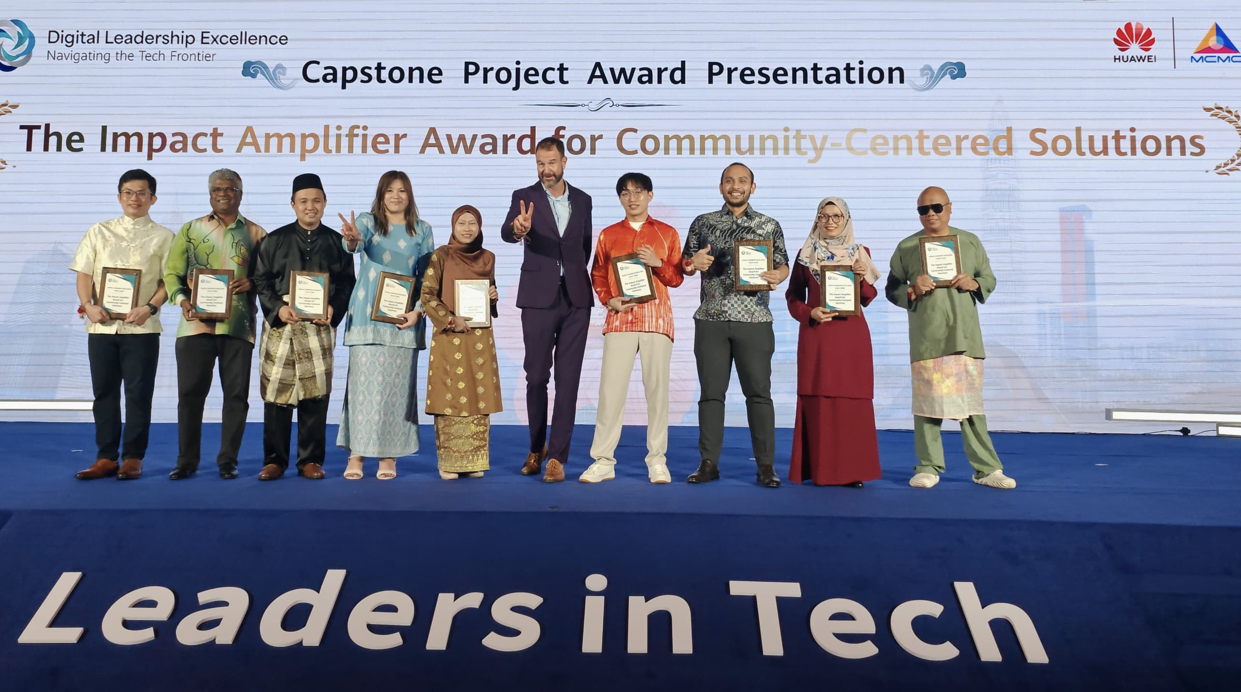 Dr Aun (fourth from right) with his teammates at the award ceremony