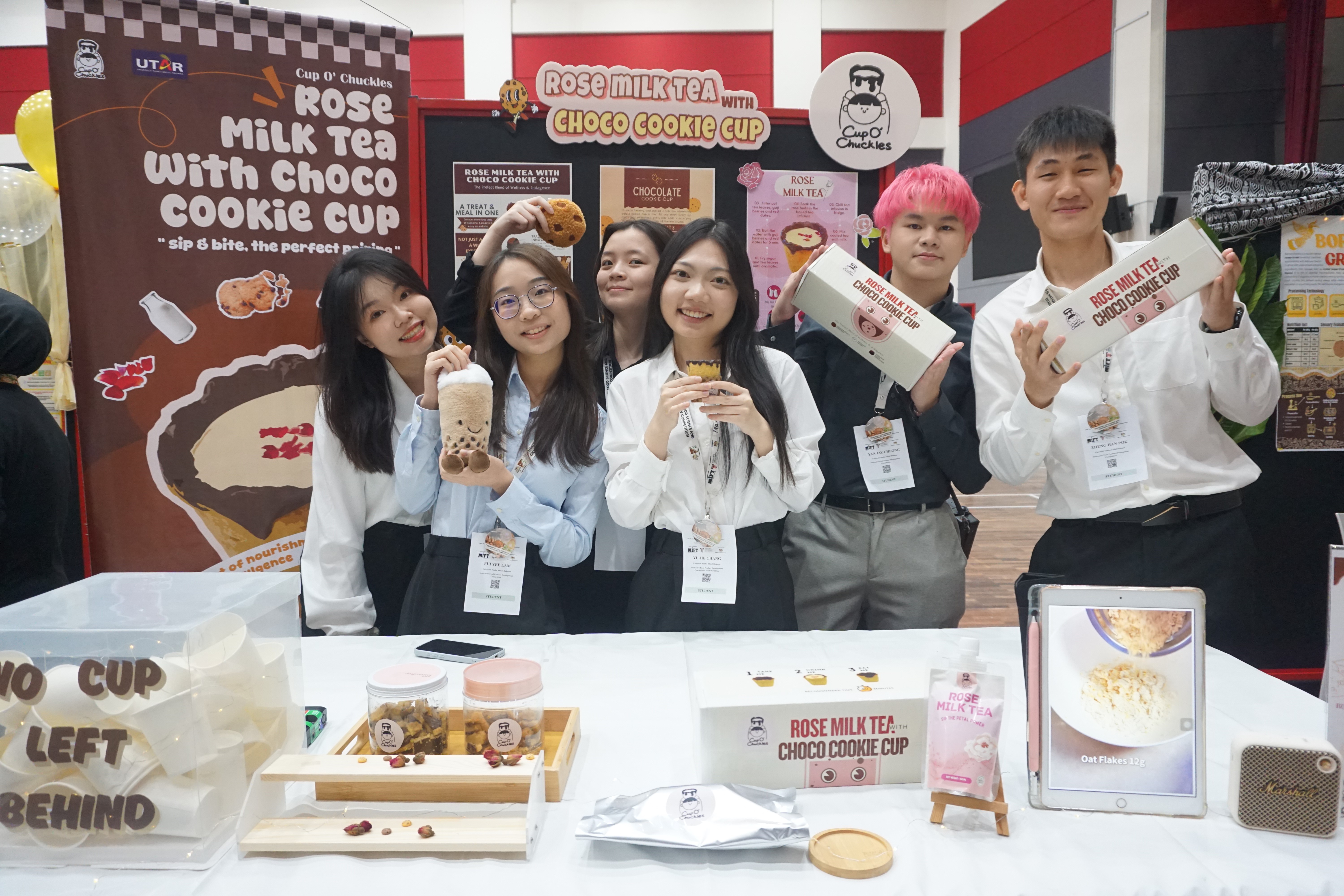 Students showcasing their food product, Rose Milk Tea with Choco Cookie Cup, during the Innovative Food Product Development Competition