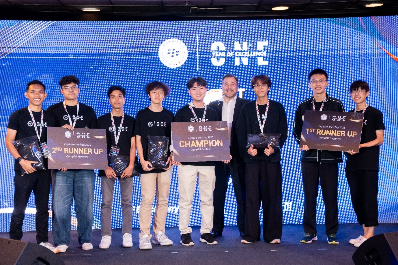 Far right: Second-place winner Team GPT-1110, with other winners 