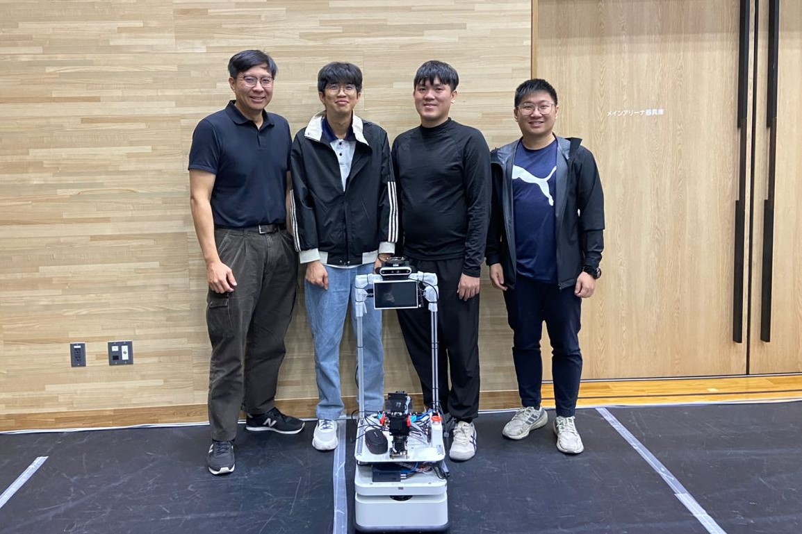 The team with their developed mobile service robot