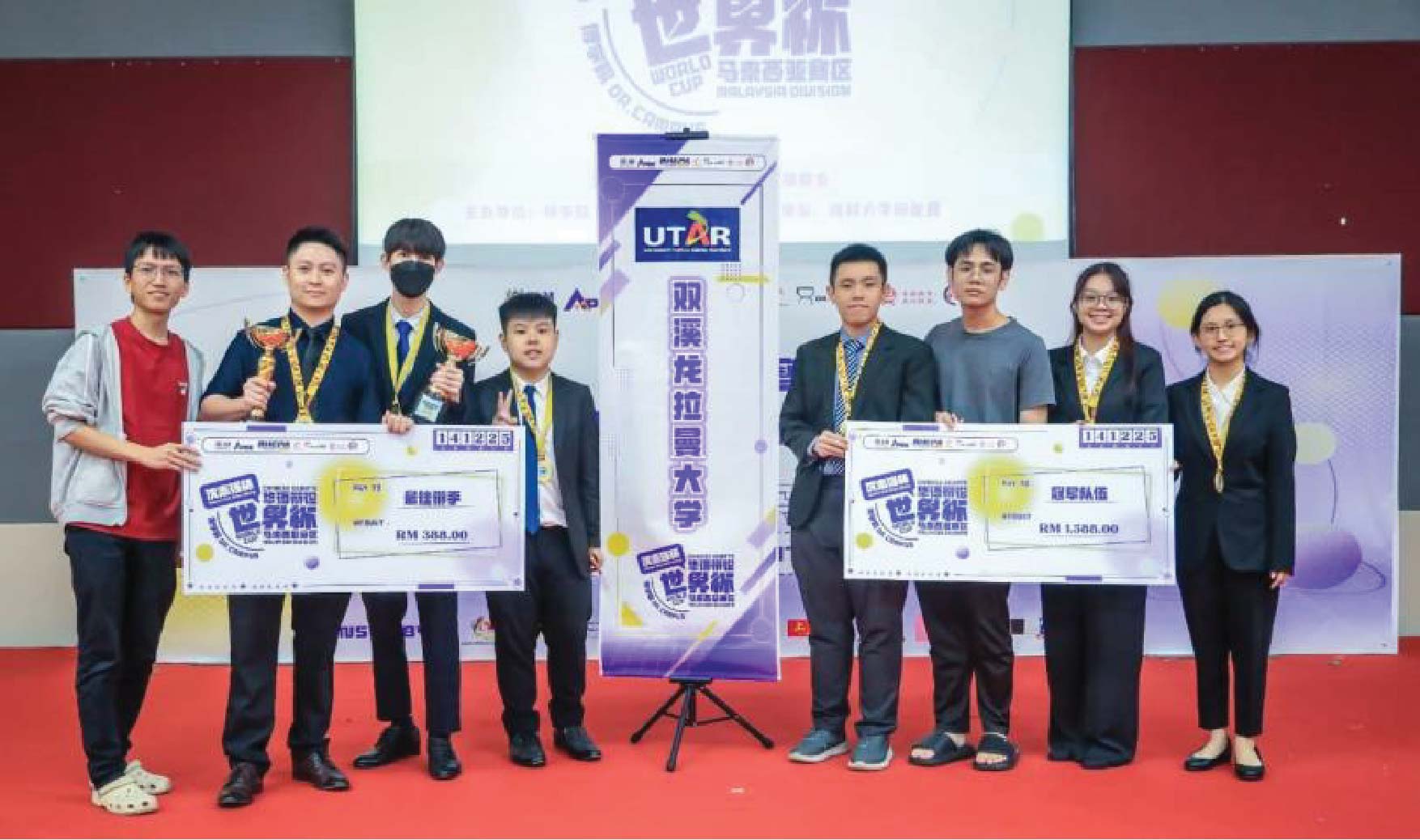 UTAR debate team celebrating their championship victory