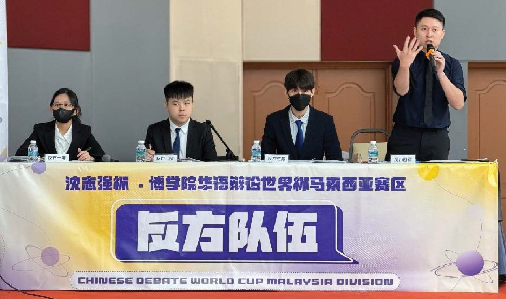 The team presenting their case during the competition