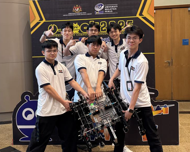 Legged Robot Team with their robot
