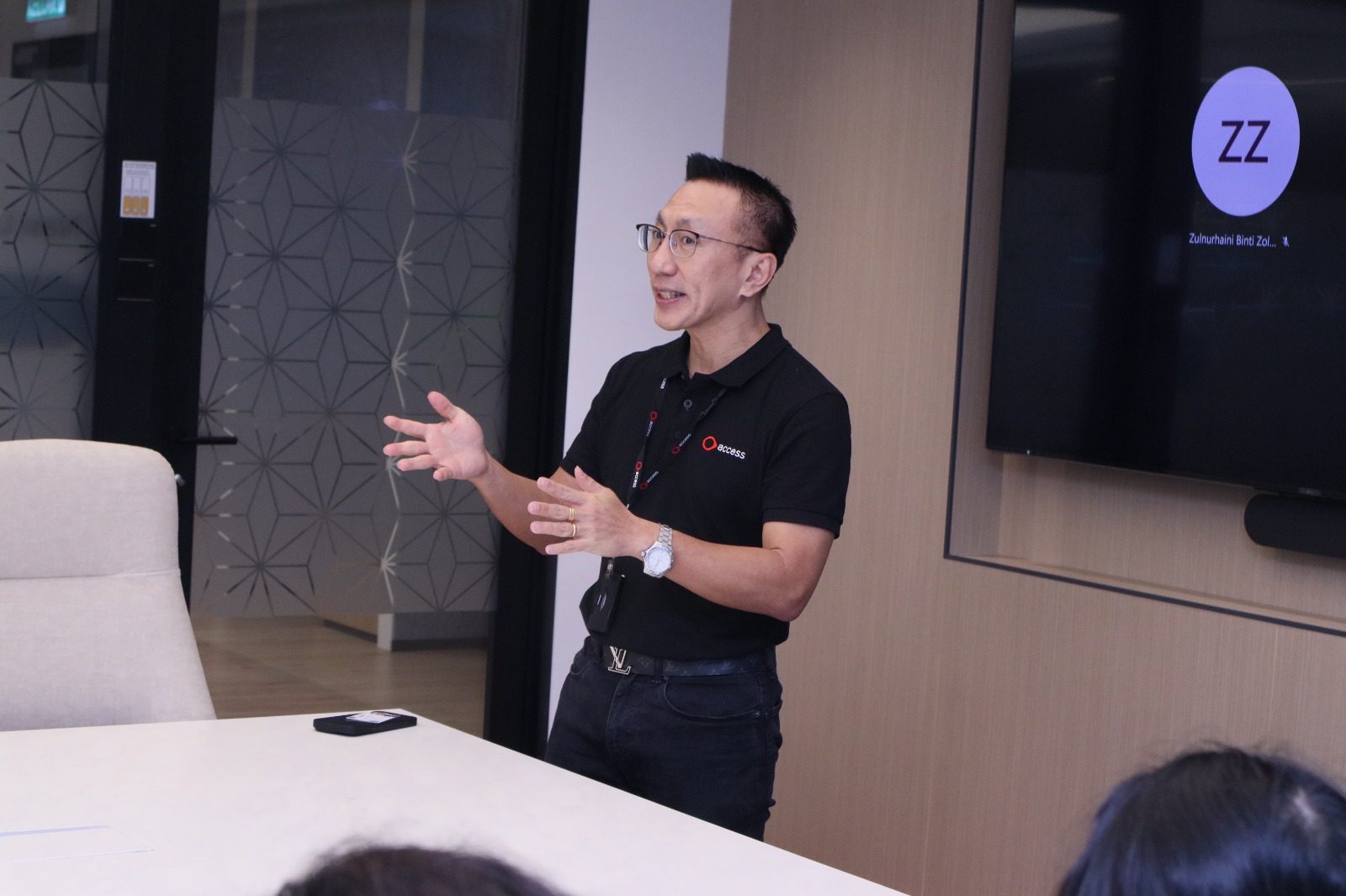 Mr Lim introducing his company