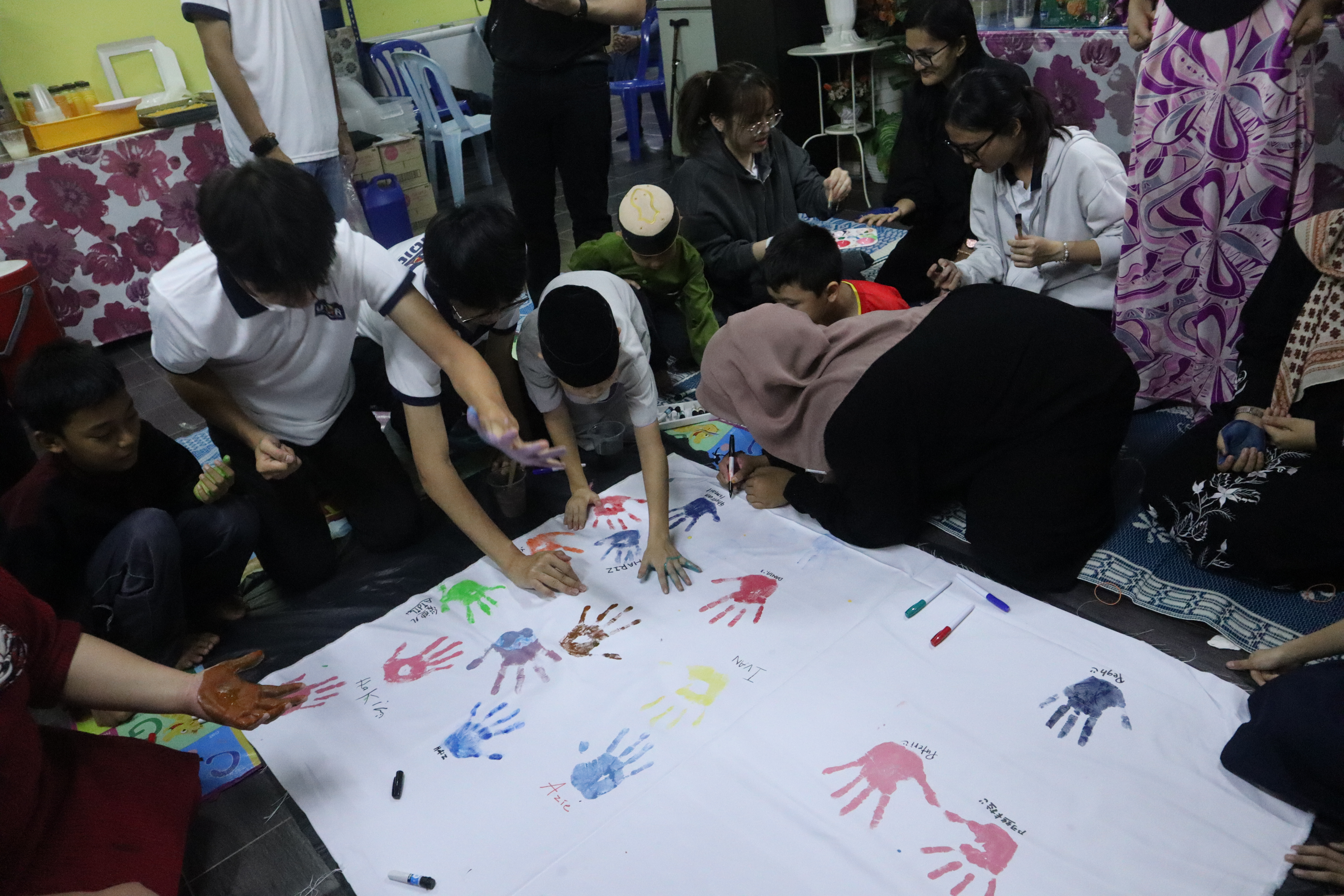 Joyful unity captured through colourful handprints 1