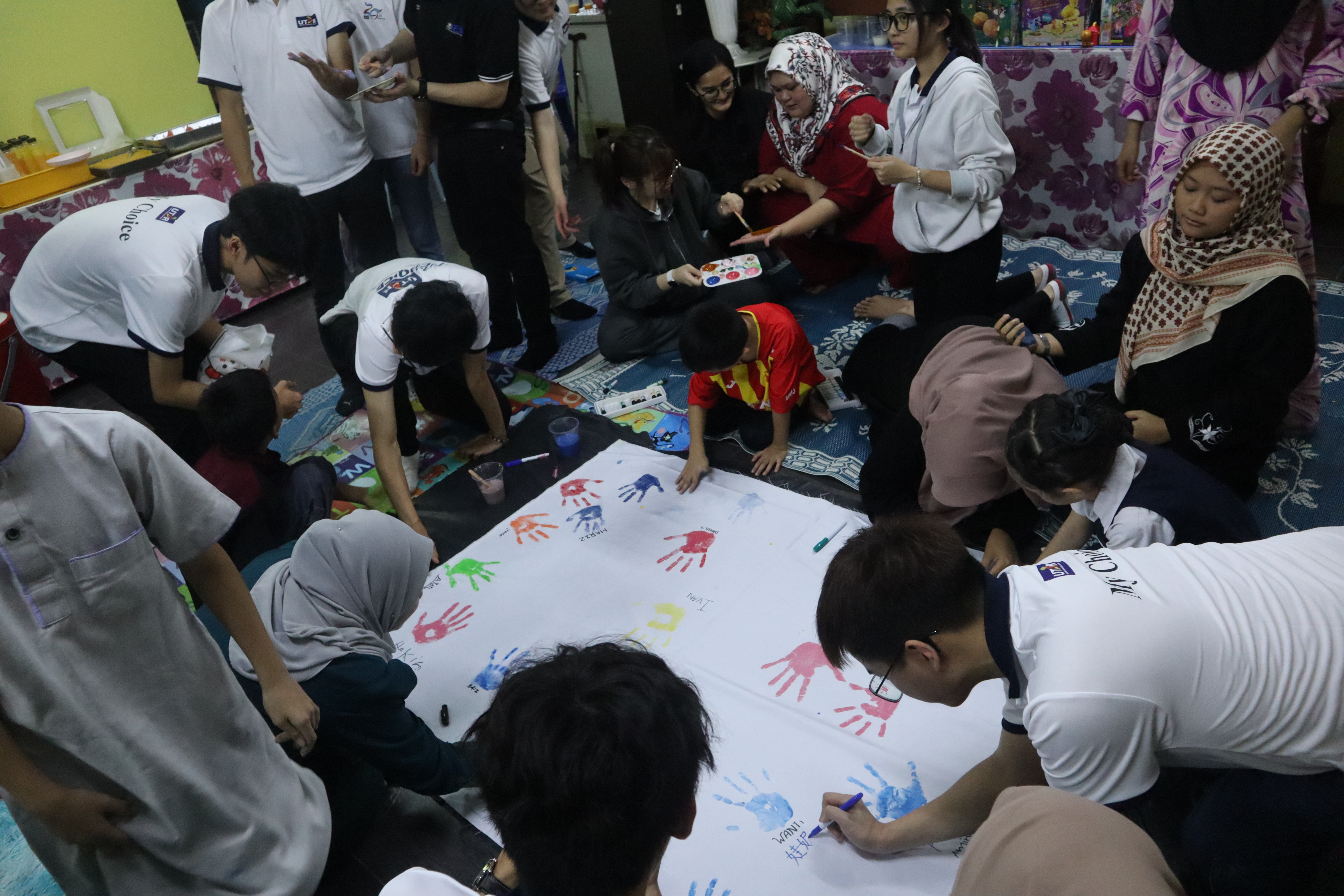 Joyful unity captured through colourful handprints 2