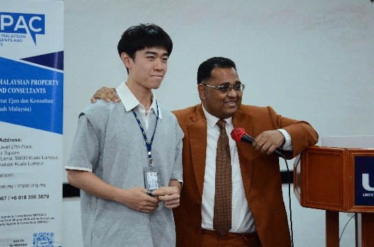 Ts Kamal interacting with student participant