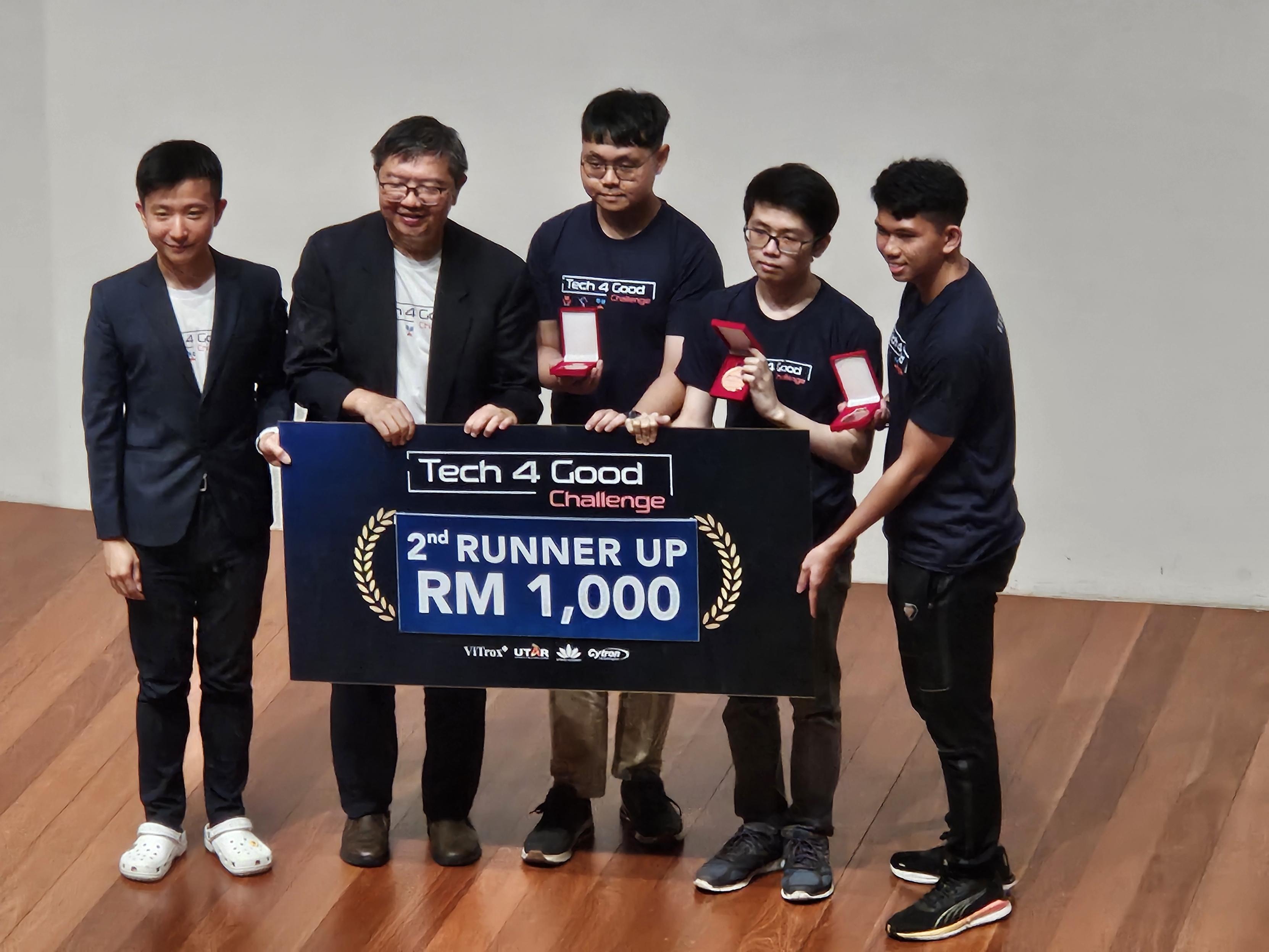 From left: Mr Timothy Chong and Prof Liew with second runner-up winners Soh Min Xuan, Ng Zhi Khai and Lee Hui Ziang