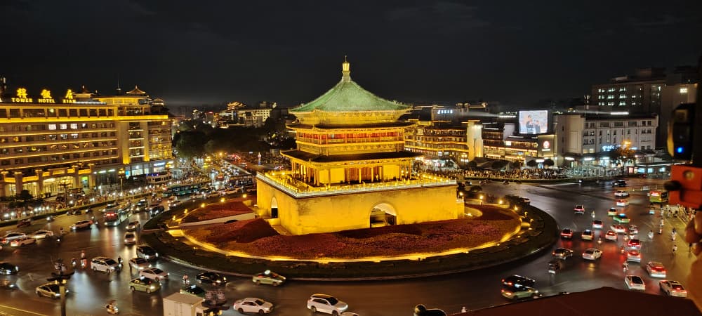 Once a keeper of time, now a sentinel of shining stories in bustling Xi’an — the Bell Tower through the eyes of visiting scholars