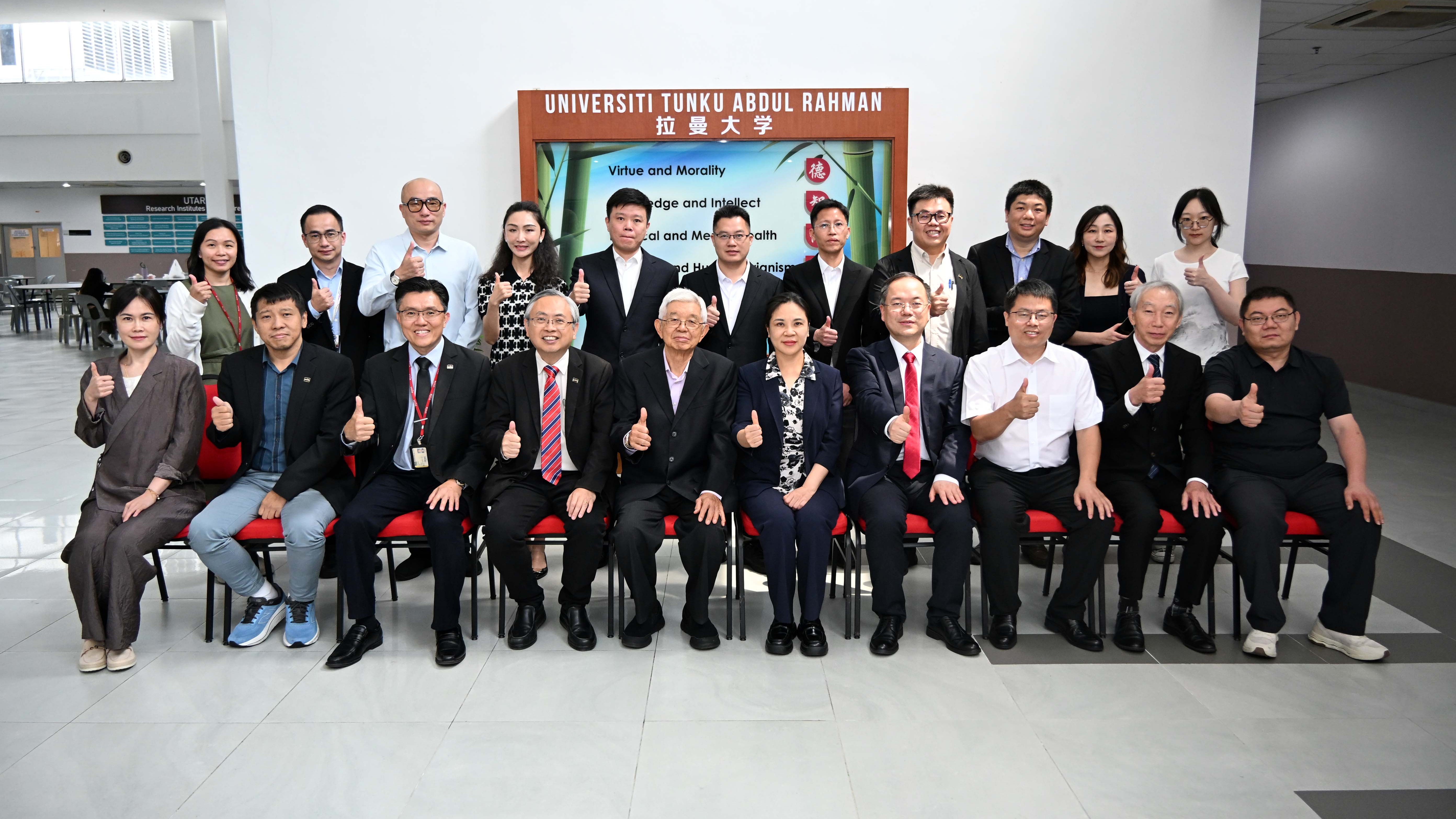 Front row, from left: Ms Pu, Prof Yap, Prof Goi, Prof Dato’ Ewe, Tan Sri Ting, Prof Wu, Prof Yu, Dr Zhang, Mr Andrew Cheah and Mr Yan