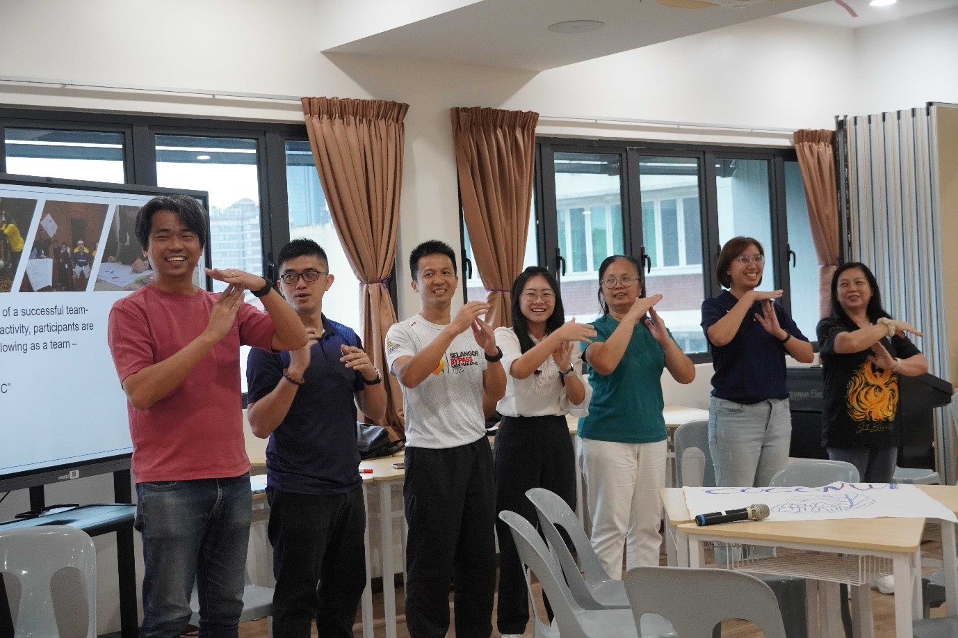 Participants practising the S.T.O.P. exercise with Mr Ng