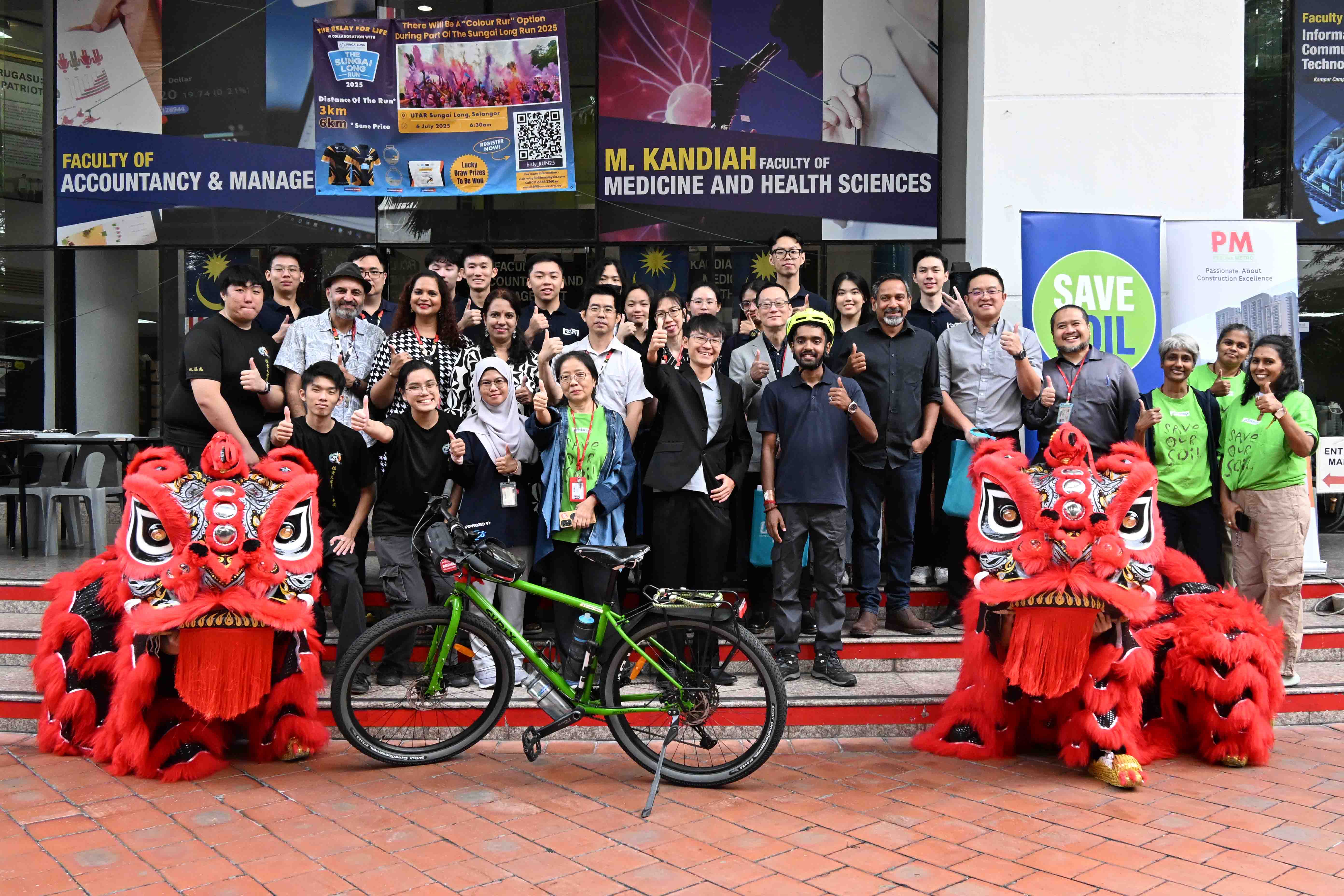 Participants and performers posed together following the vibrant lion dance welcome for Mr Sahil
