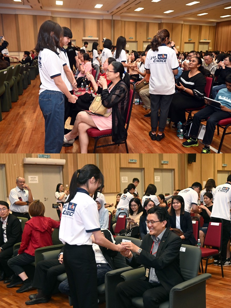 Recipients serving tea to their parents as gratitude for their unwavering support