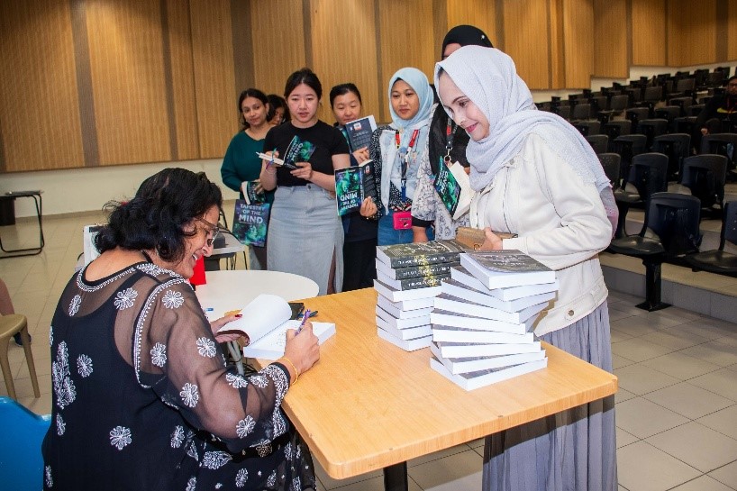 Dr Aneeta signing her books