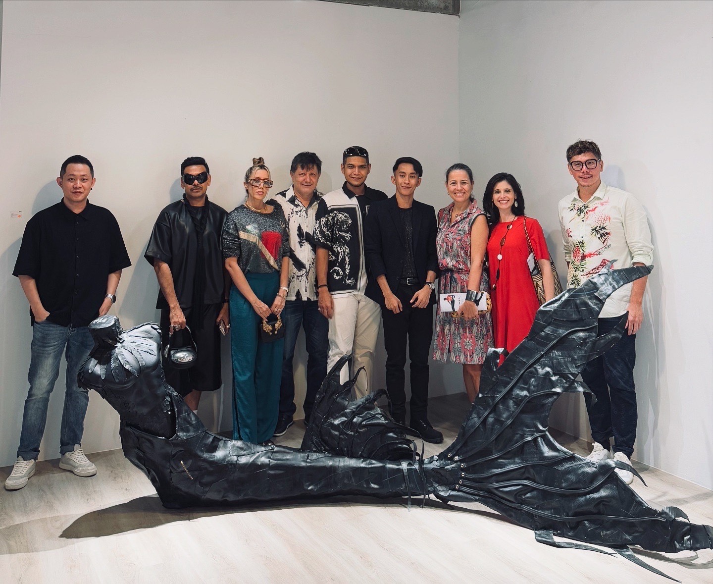 Visitors supporting Mr Anis (fourth from right) at the exhibition