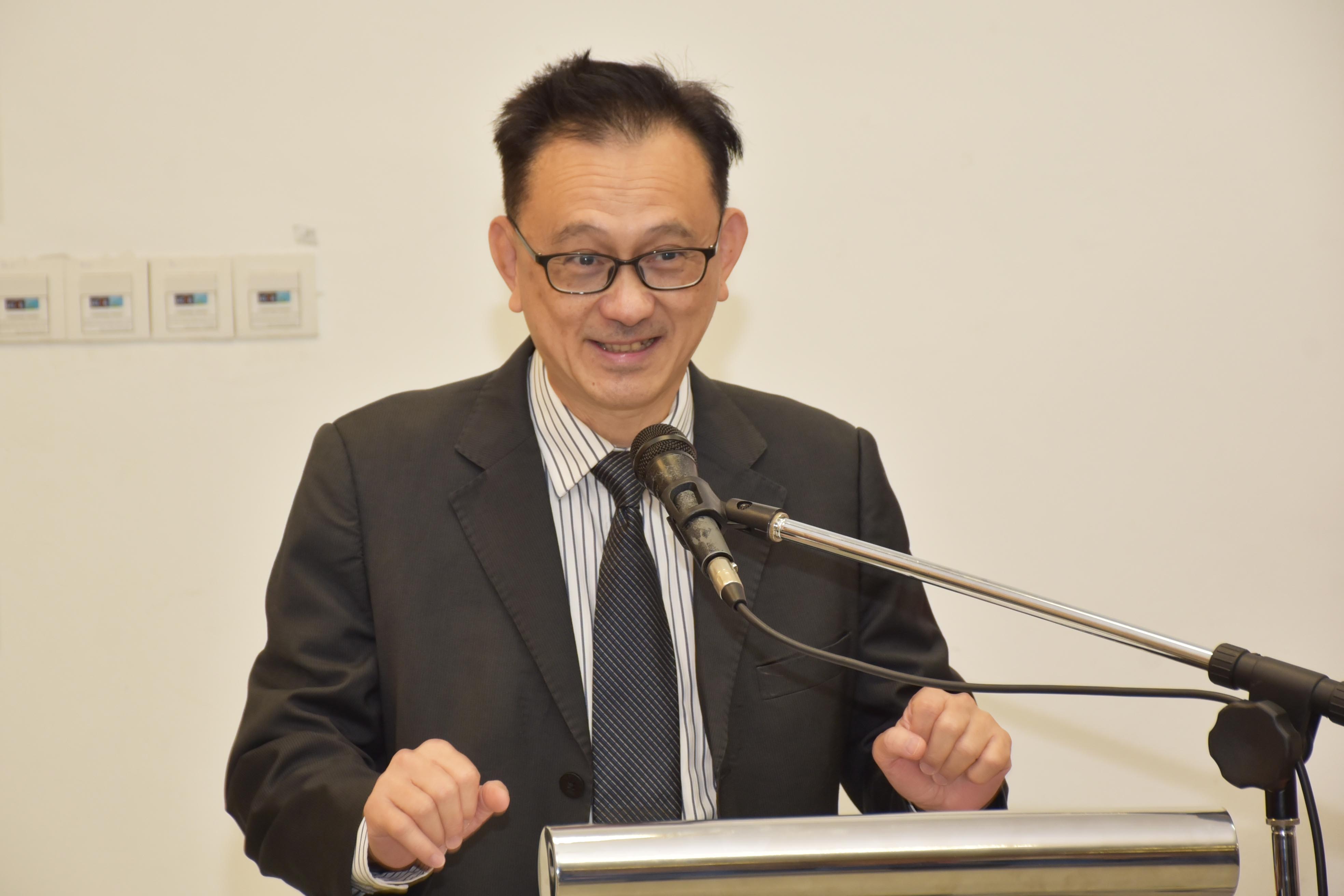 Mr Daniel Chan delivering his keynote address