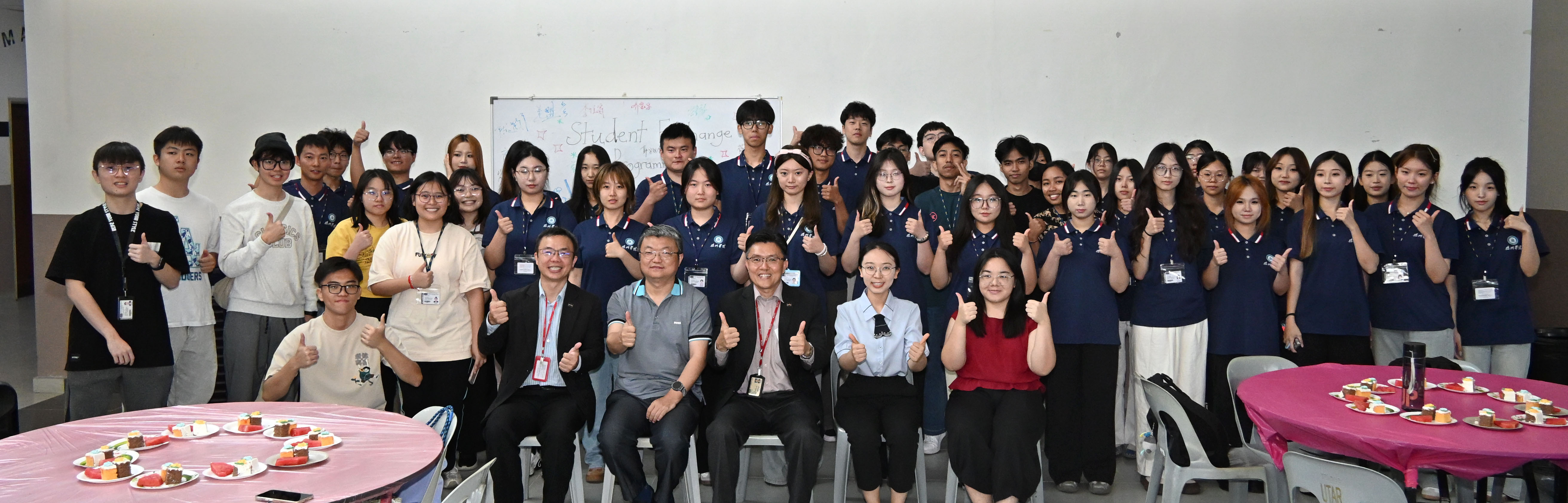 Seated from left: Dr Lim, Mr Tian, Prof Goi, Ms Wang and Ms Wong