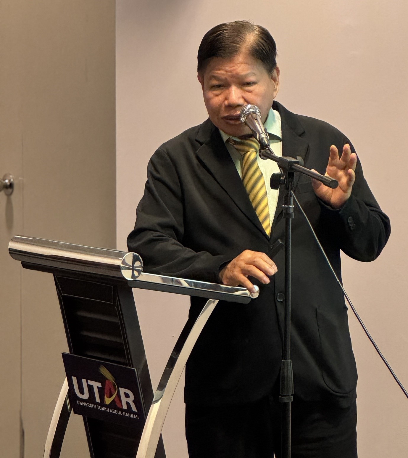 Mr Bao talking about his invention
