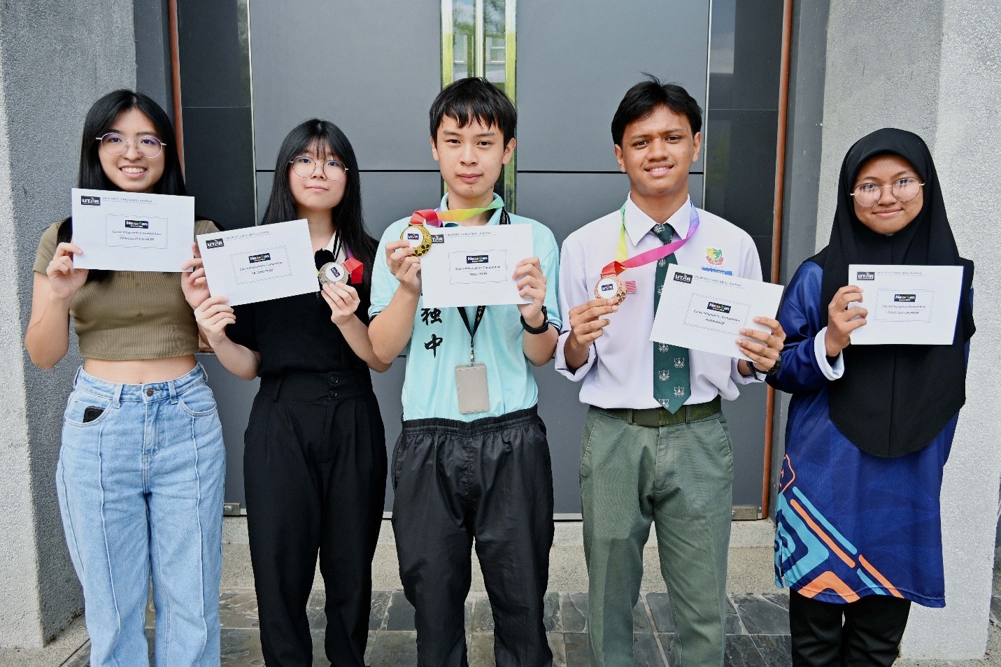 A gathering of creative minds celebrating their triumph at the Canva Workshop & Infographic Competition