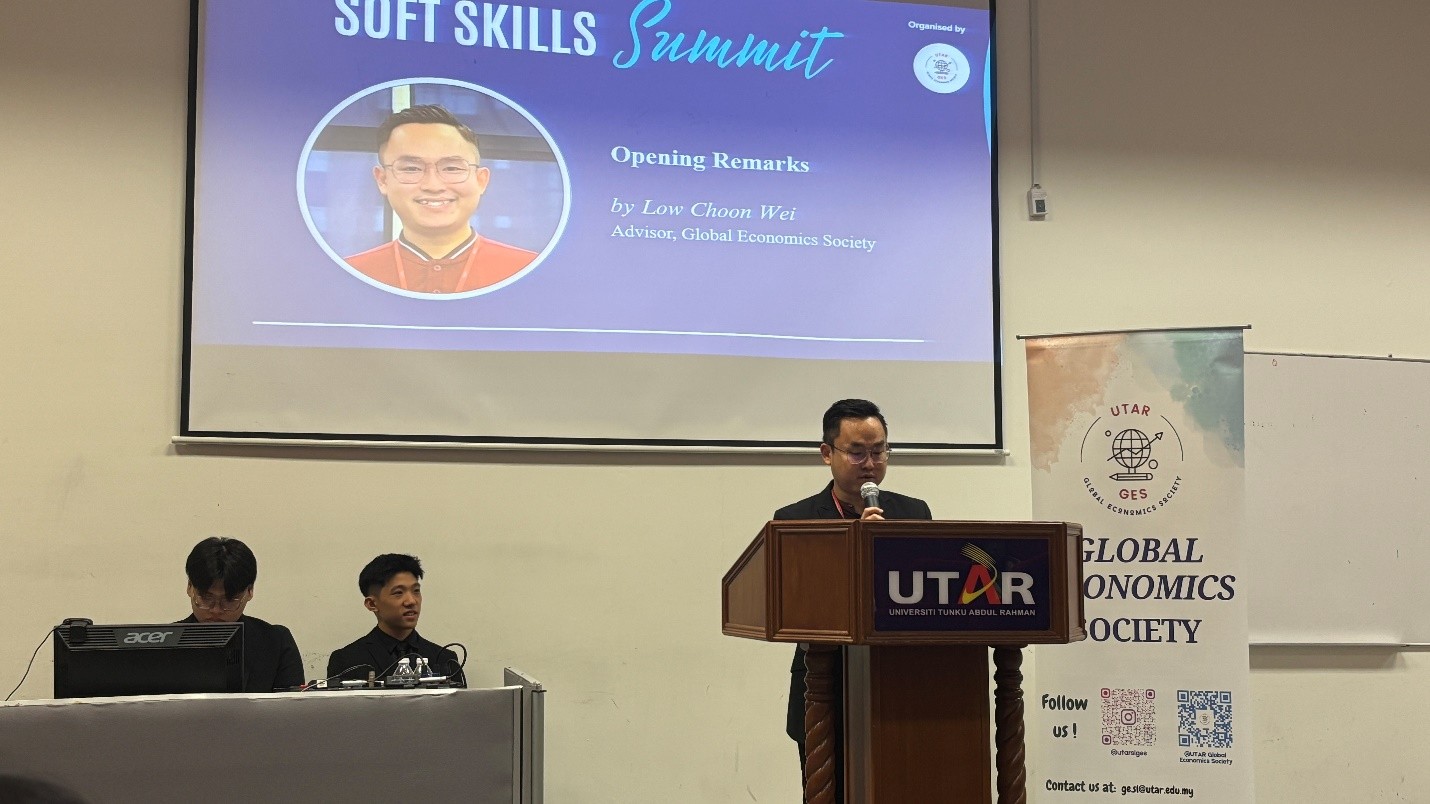 Mr Low welcoming speakers and participants