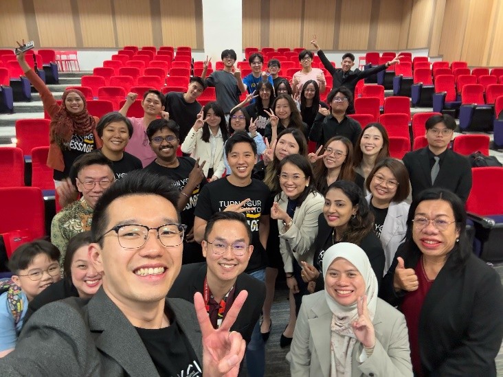 Mr Low (left photo) and Mr Tay (right photo) taking group photo with participants 2