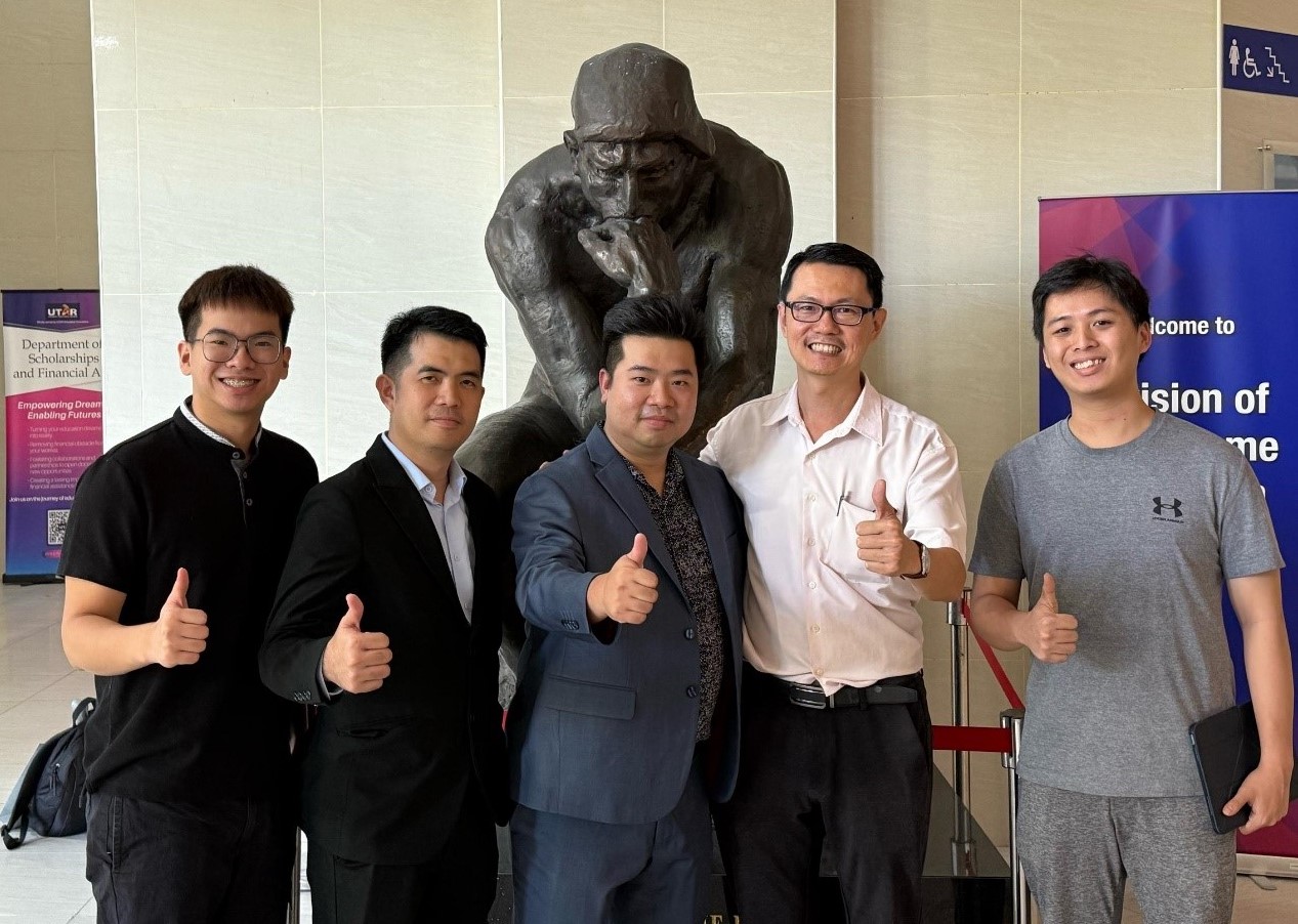 All smiles for the bright future of the railway industry (from left): Samuel Hu, Mr Tan, Mr Ng, Dr Chua, and Lim