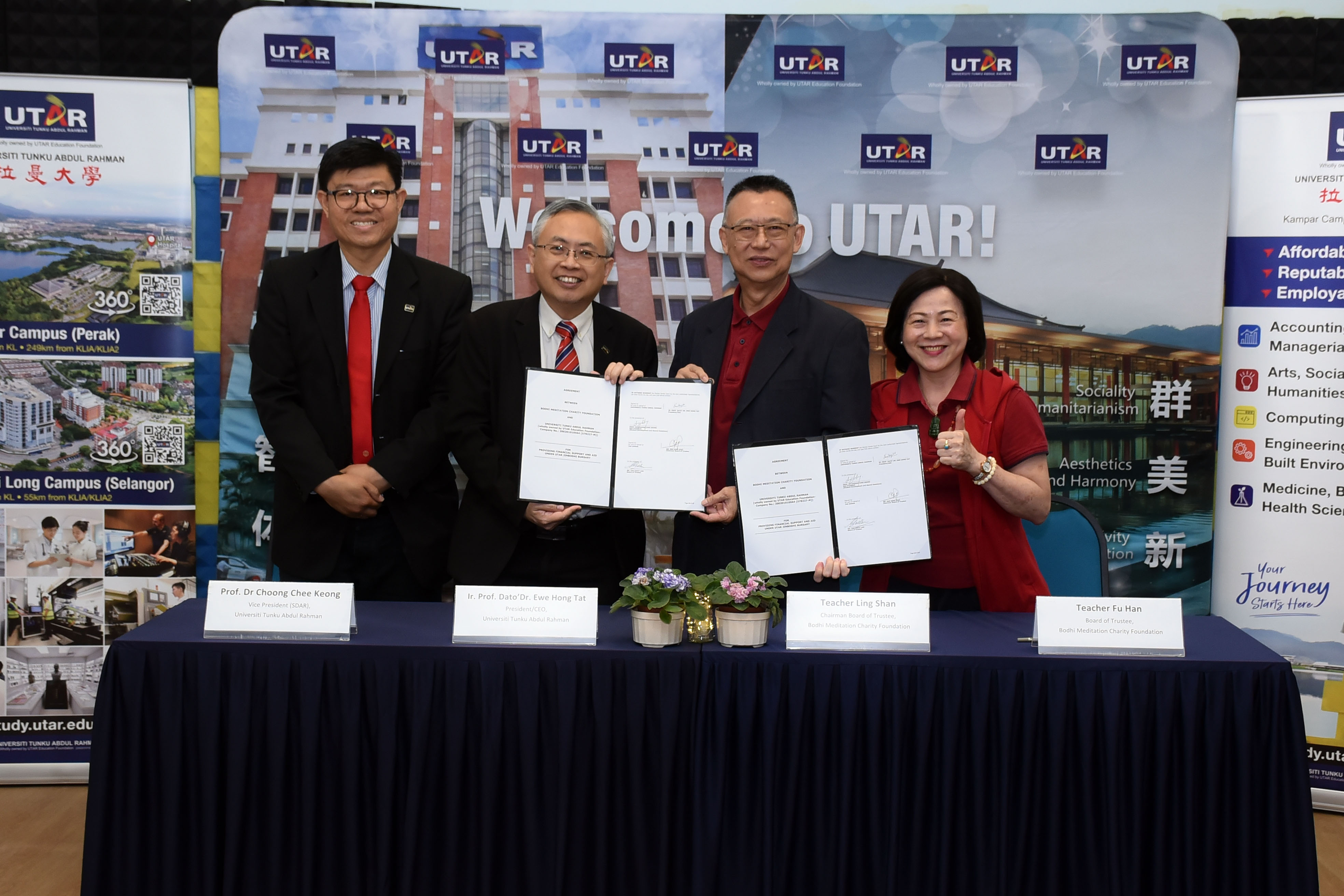 Prof Dato’ Ewe (second from left) and Teacher Ling Shan (second from right) with the signed documents, accompanied by Prof Choong (far left) and Sister Fu Han