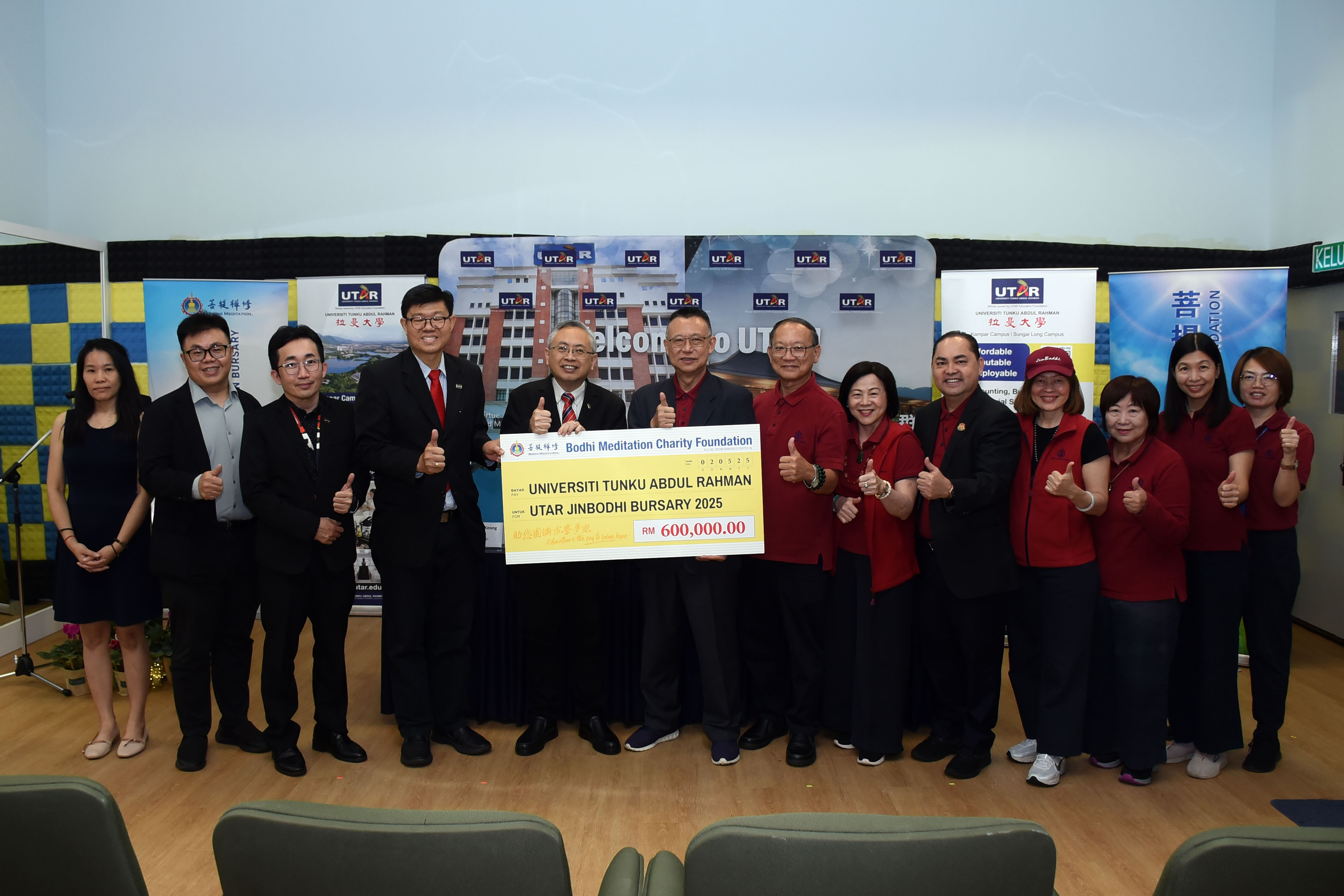 Mock cheque handover ceremony