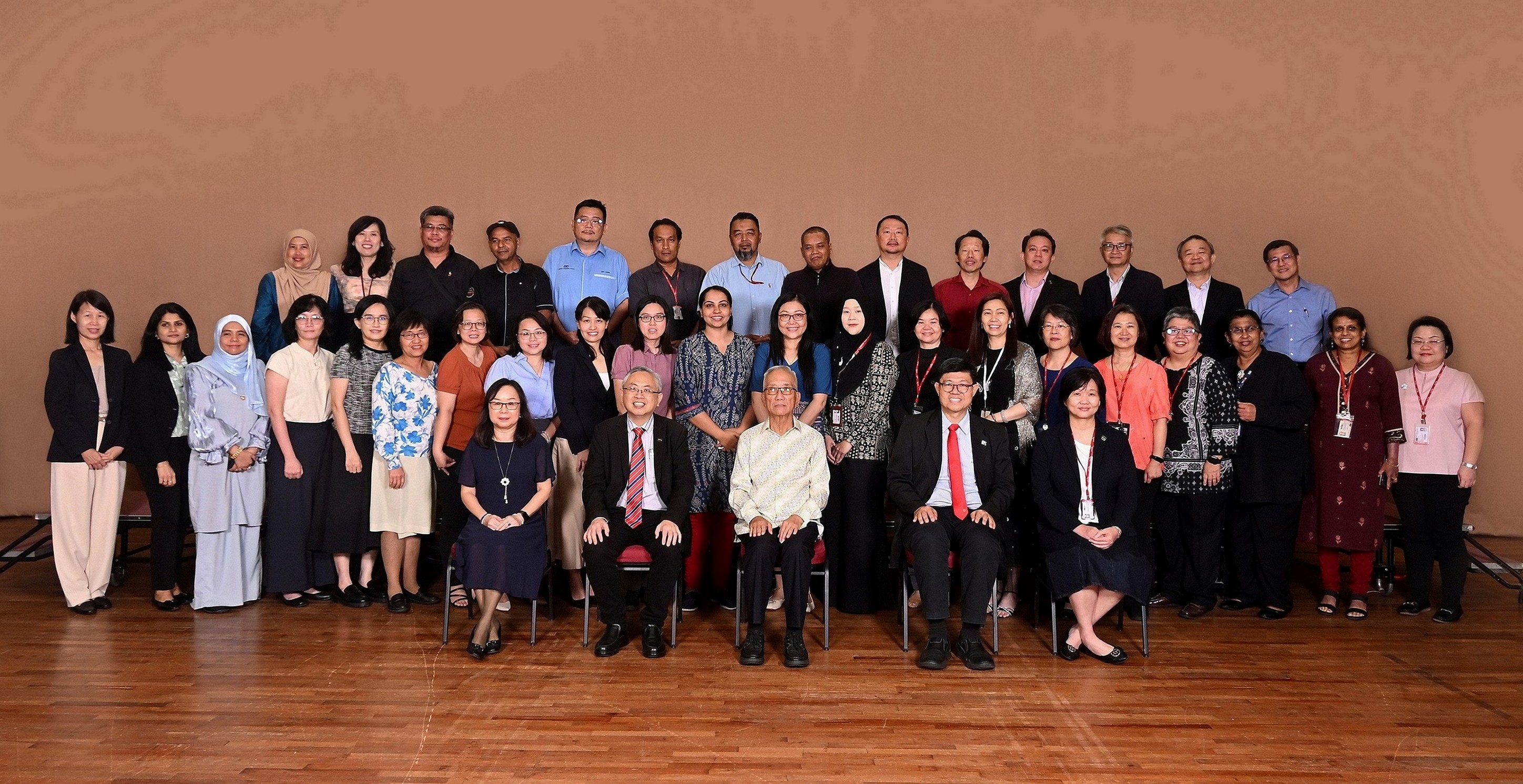 Seated from left: Ms Marchie Lim, Prof Dato’ Ewe,  Datuk Lim, Prof Choong, and Ms Loh with the recipients of 20 Years Staff Long Service Award