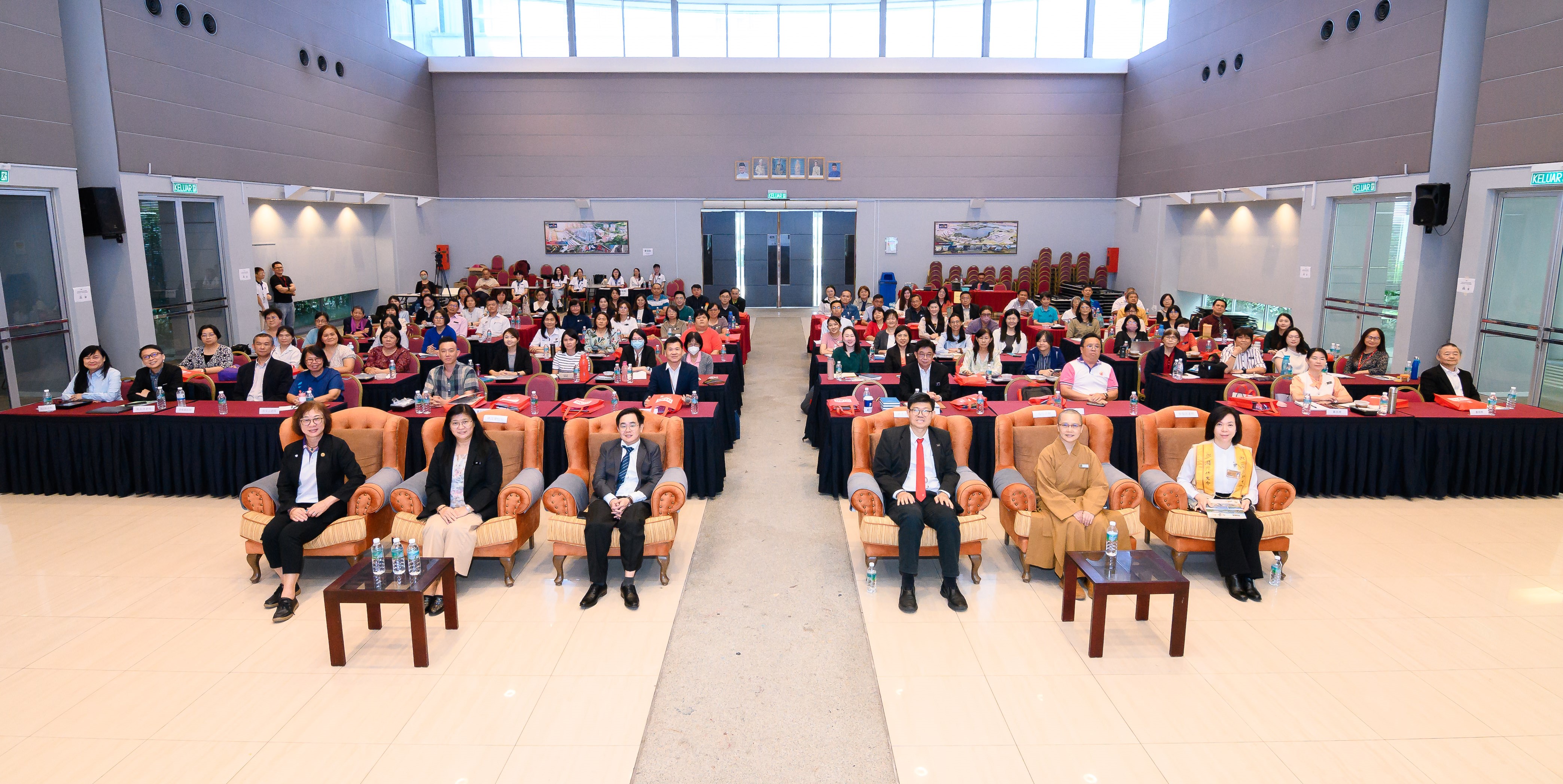 Front row, from left: Ms Chong, Ms Lim, Dr Tan, Prof Choong, Venerable You Deng and Ms Chen with guests and participants during the opening ceremony
