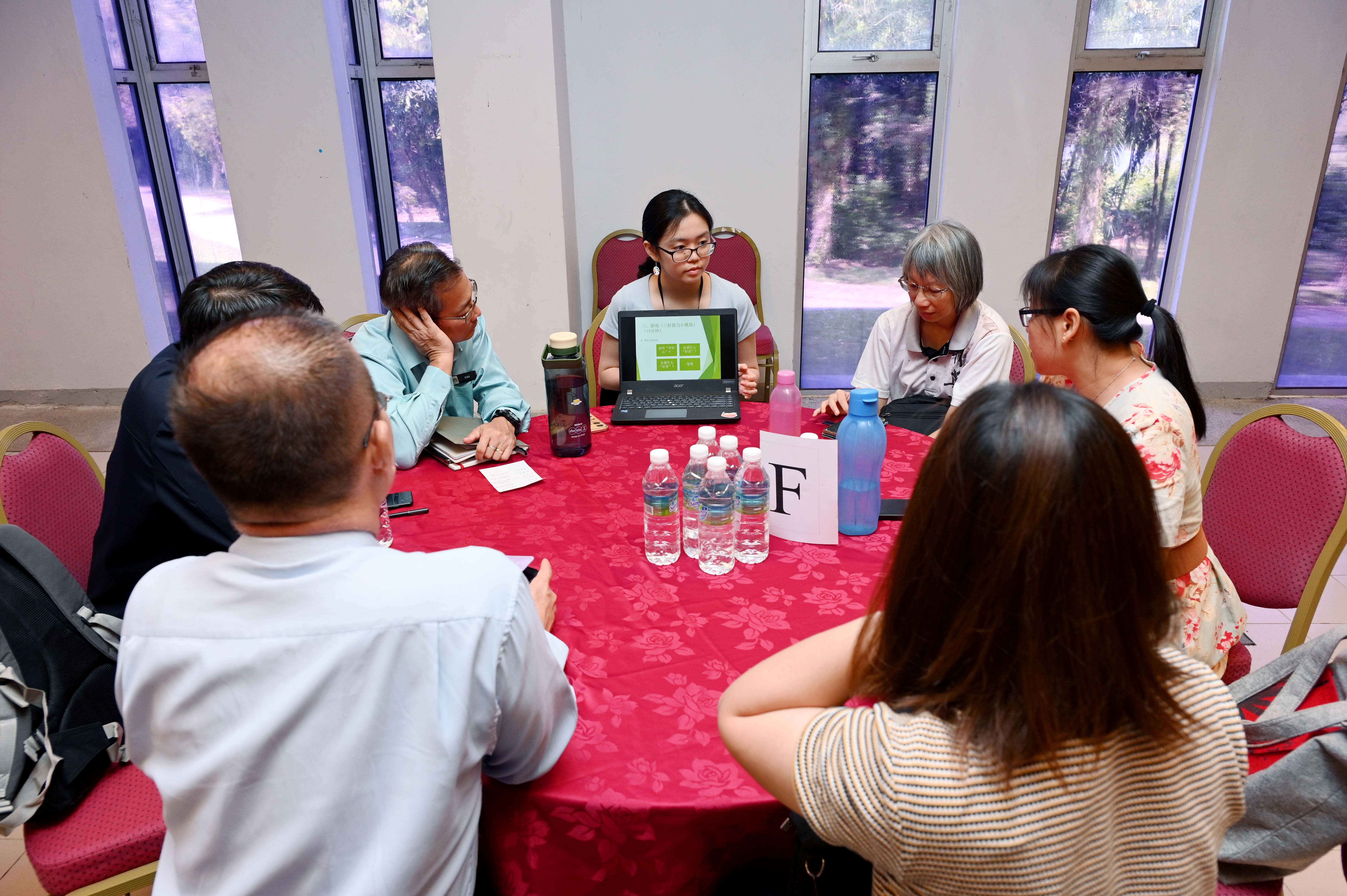 Participants exchanging ideas while making new friends 