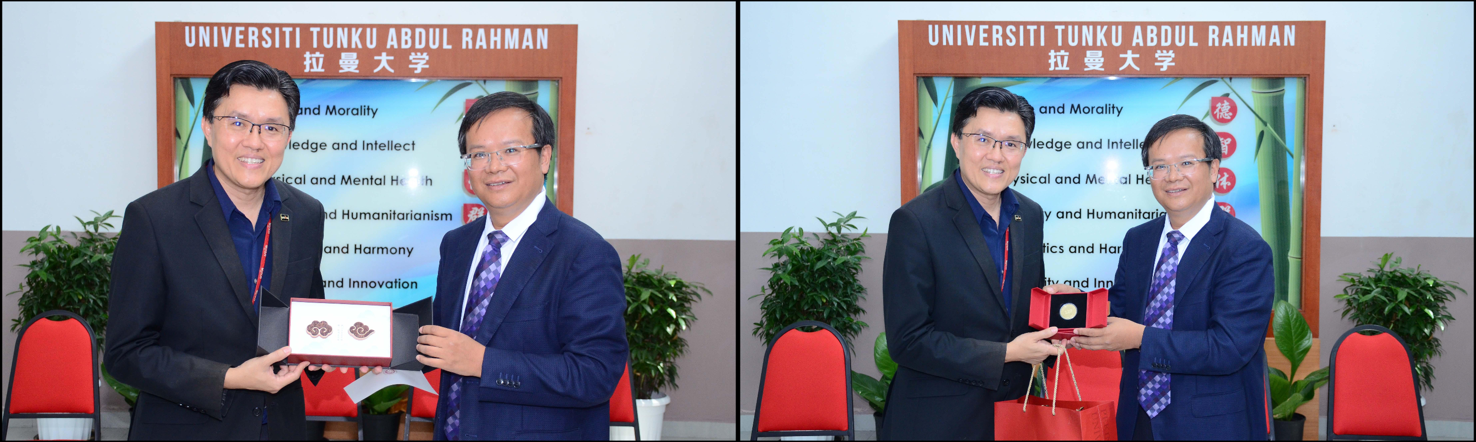 Prof Tian (right) presenting a token of appreciation to Prof Goi