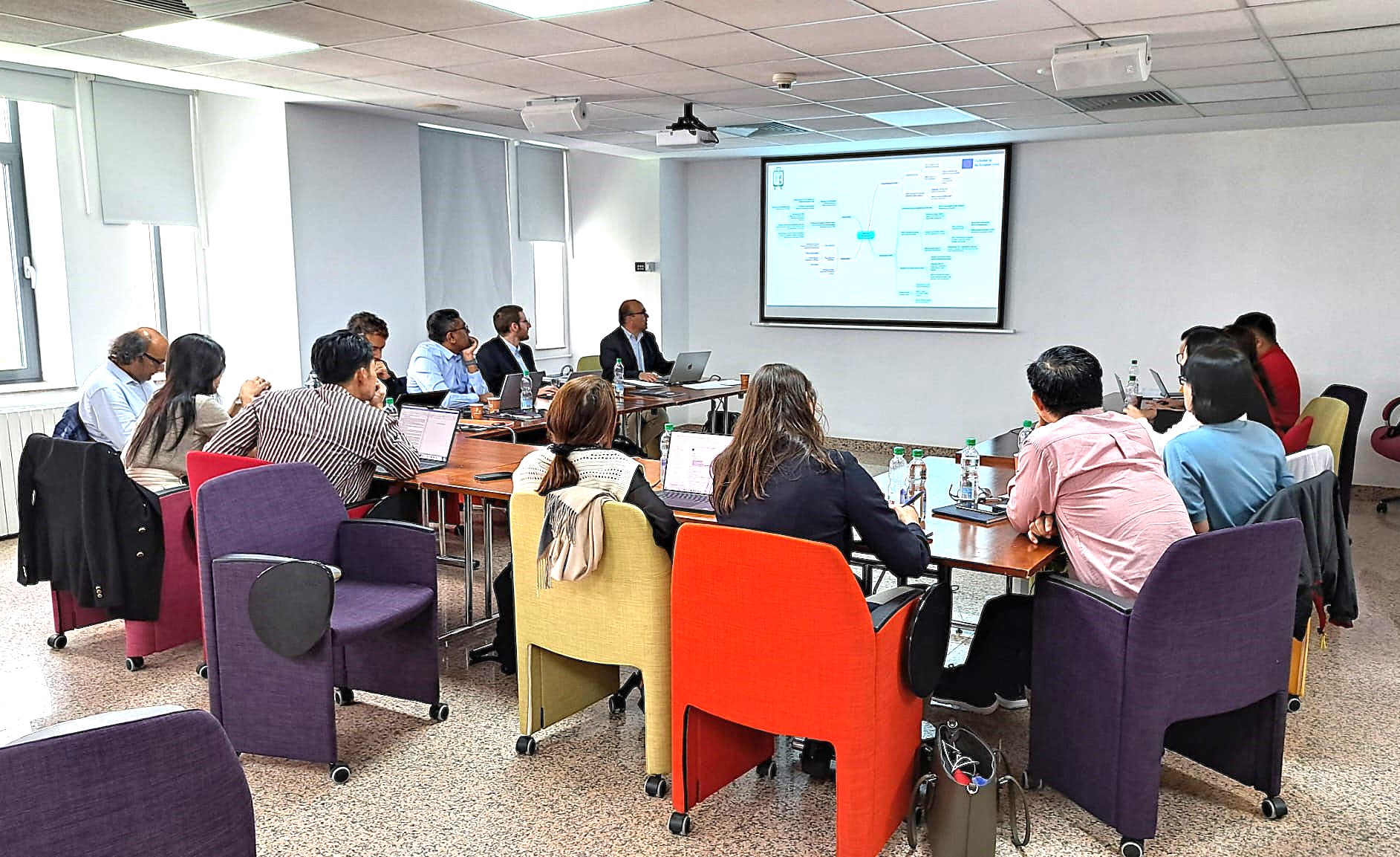 Discussion session during the 4th SOHO Transnational Project Meeting, fostering cross-border collaboration on sustainable tourism education
