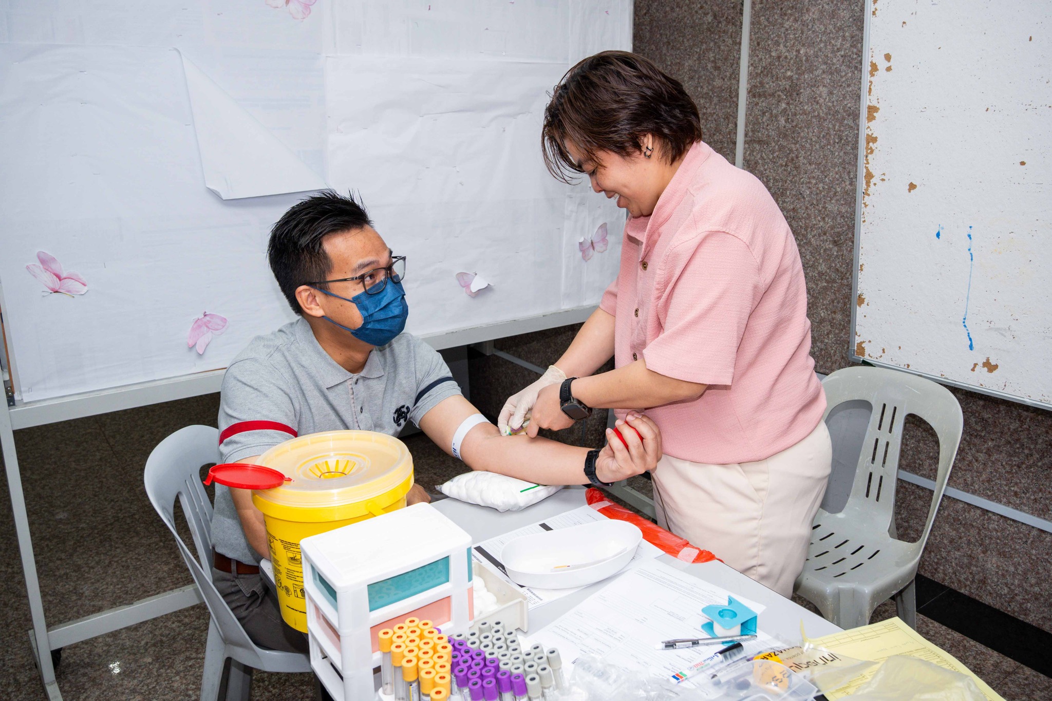 UTAR staff undergoing health screening at the South Lobby of UTAR Sungai Long Campus