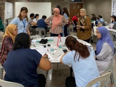 UTAR staff undergoing health screening at the South Lobby of UTAR Sungai Long Campus