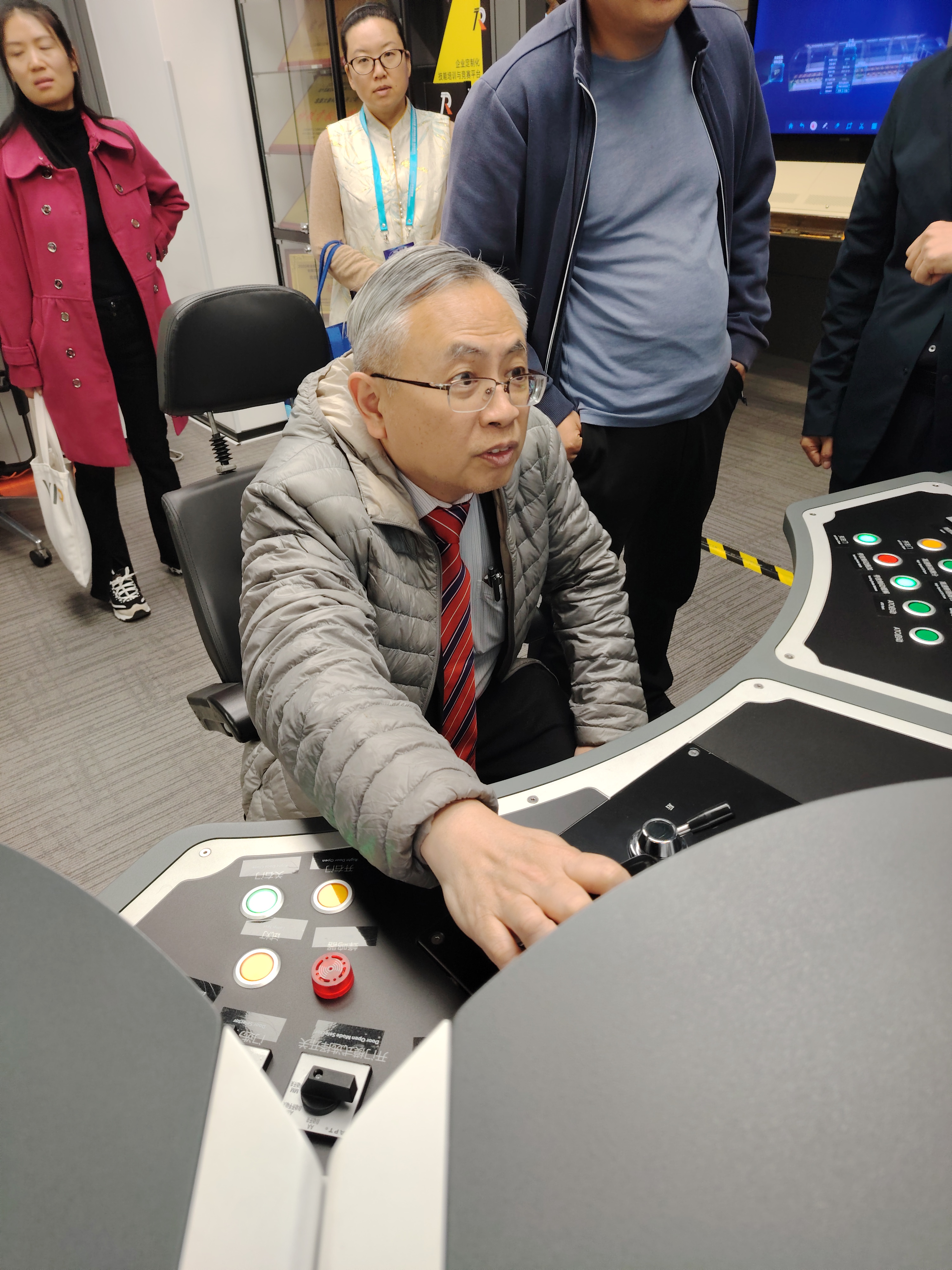 Prof Dato’ Ewe testing the train simulator during the technical visit to TCT