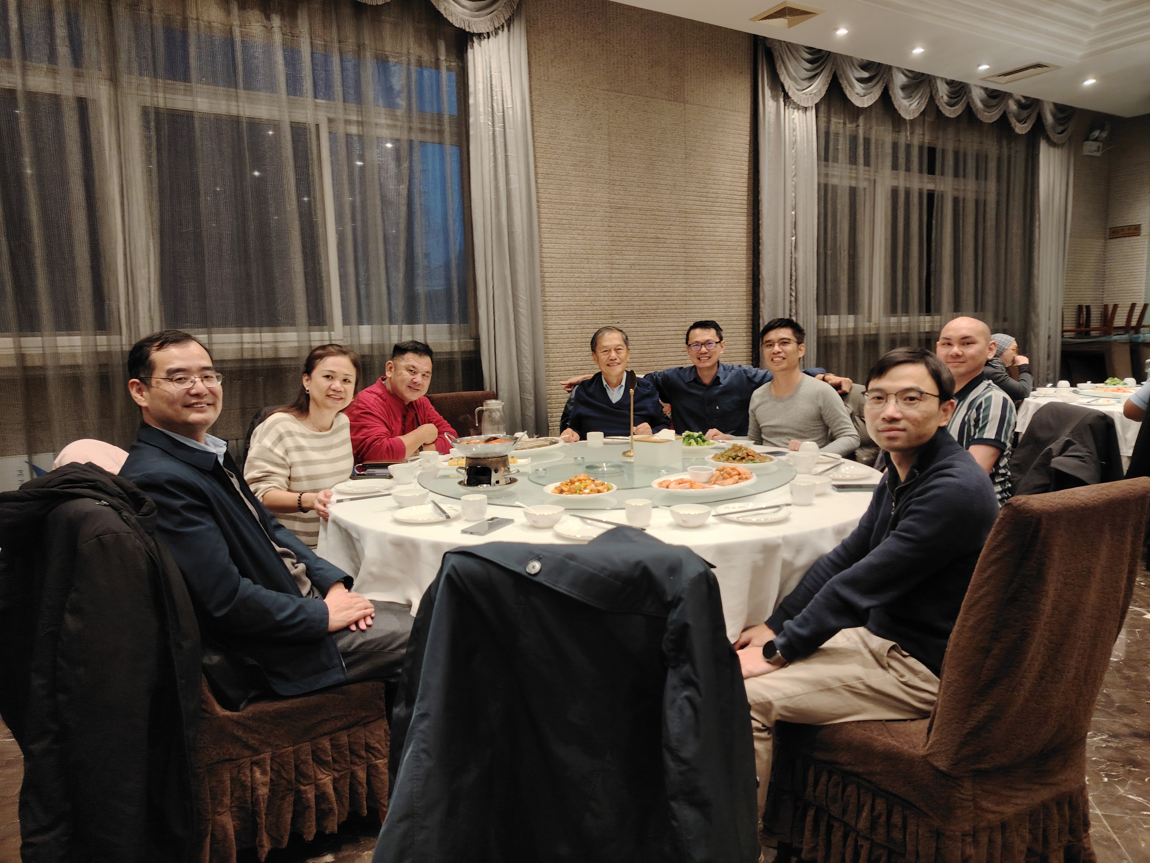 Delegates attending a networking dinner with the Beijing Jiaotong University organising committee