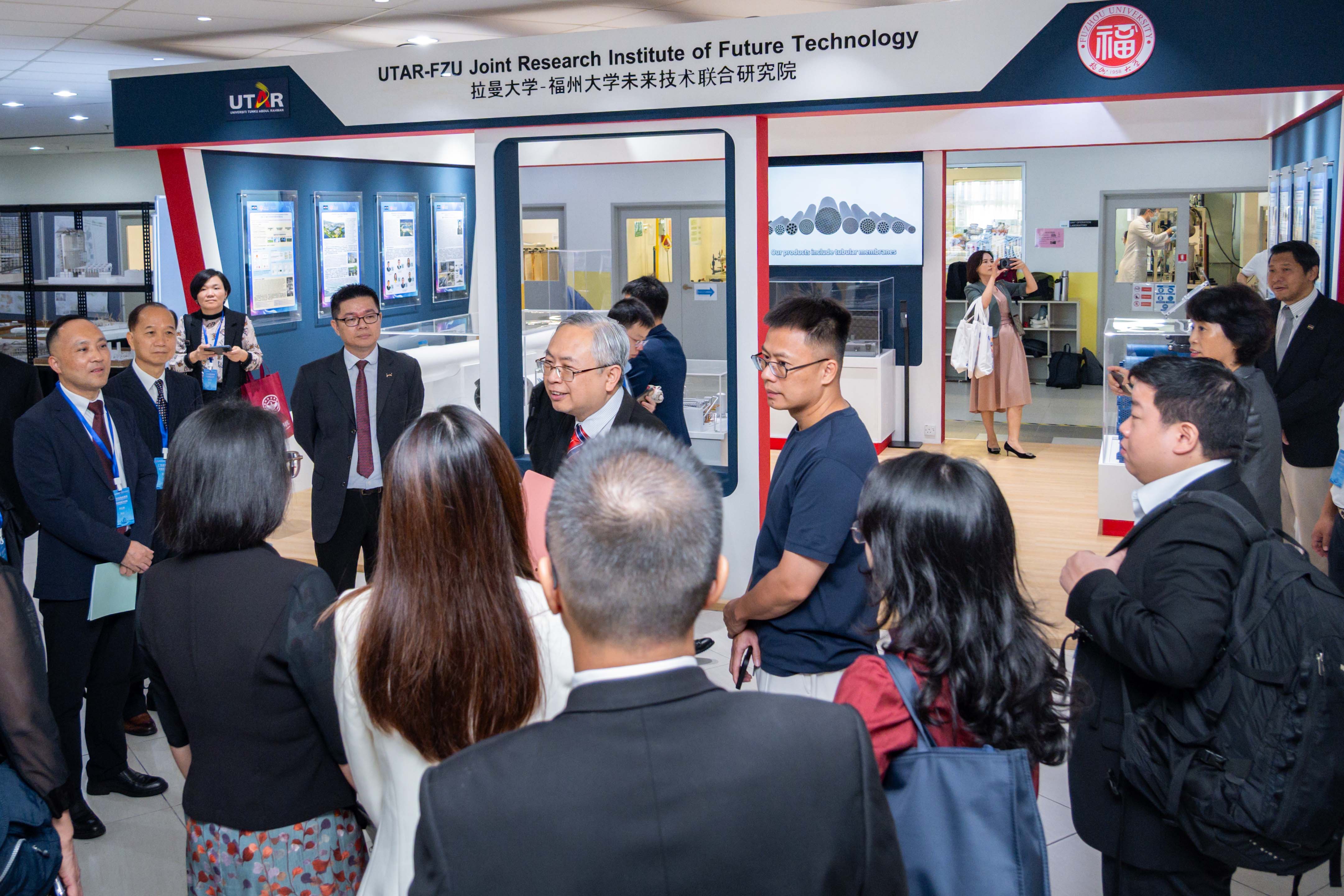 Delegates exploring UTAR’s academic and research facilities during the campus tour