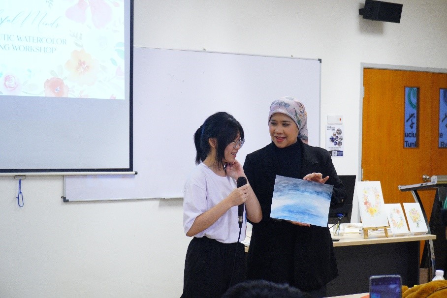 Students expressing creativity in the Watercolour Painting Workshop led by Puan Suriati