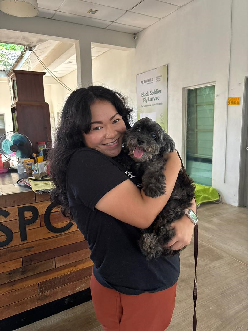 Ms Cozzanne with the shelter’s dog named Bobo