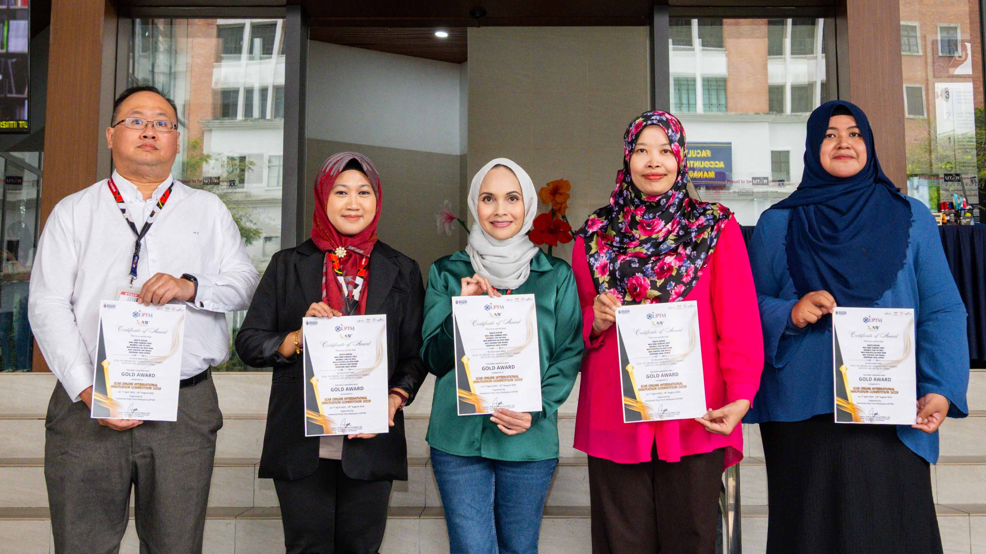 UTAR team (from left): Mr Maxwell Sim, Dr Wan, Dr Nadya, Pn Wan Norfadillah, and Cik Nur Farhana with their certificate of achievement