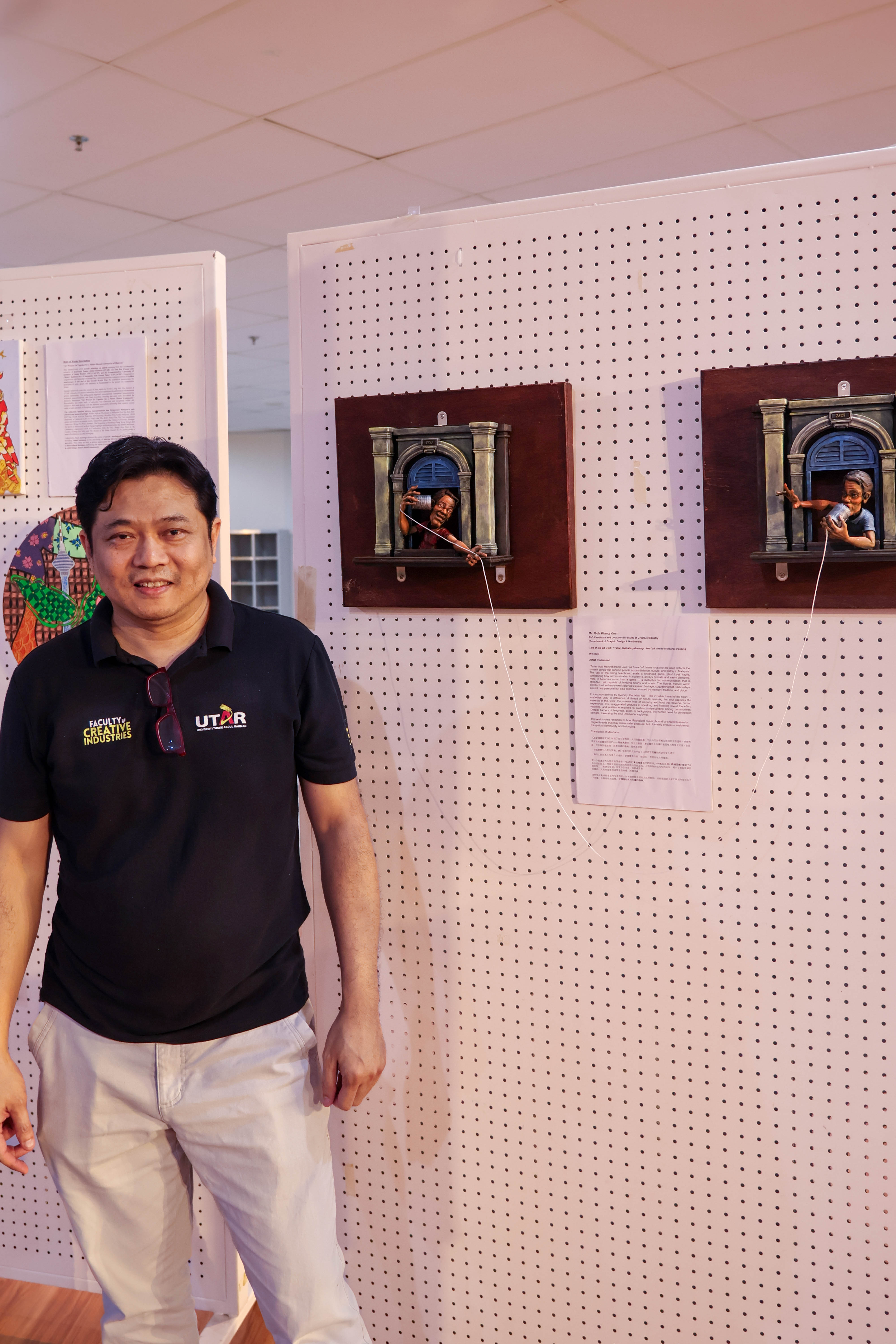 Mr Goh with his artwork