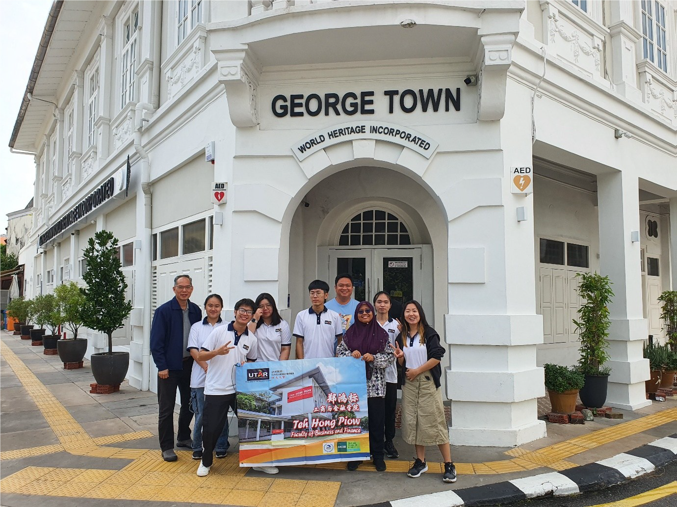 Group photo of participants in front of the George Town World Heritage Incorporated (GTWHI) office