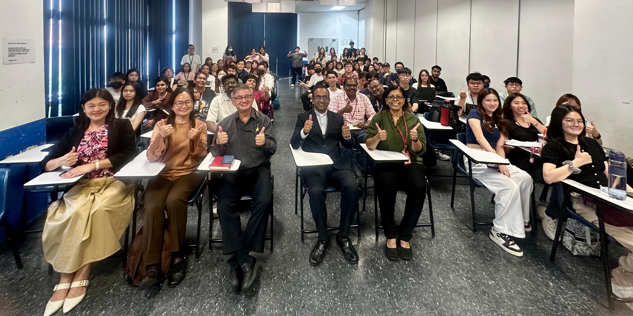 Dr Paulachan (front row, fourth from left) with academics and students