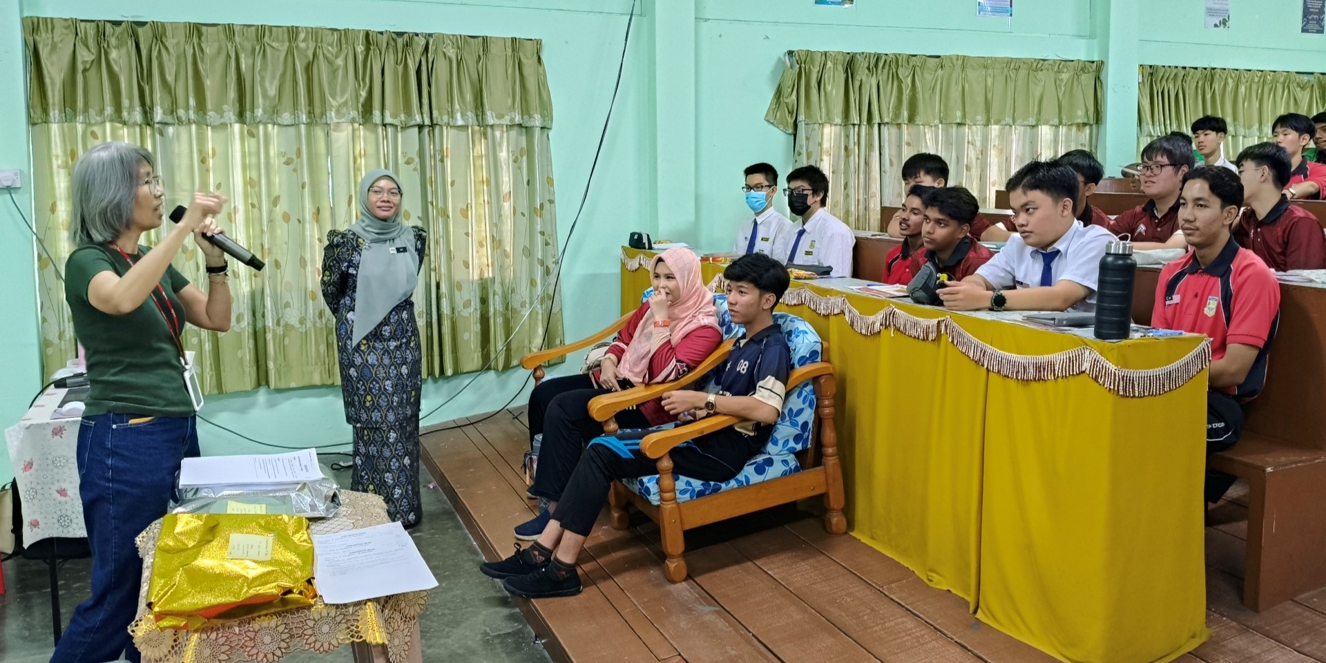 From the top: Ms Foo, Ms Loh and Ms Chin explaining THP FBF programmes
