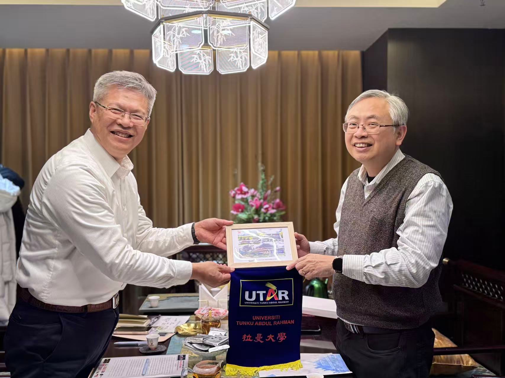 Souvenir exchange with Chaoyang Normal University